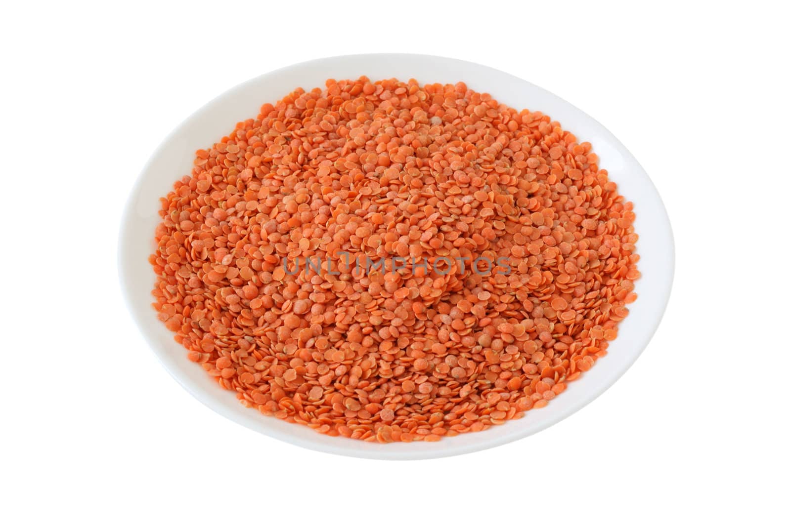 dry red lentil on the plate