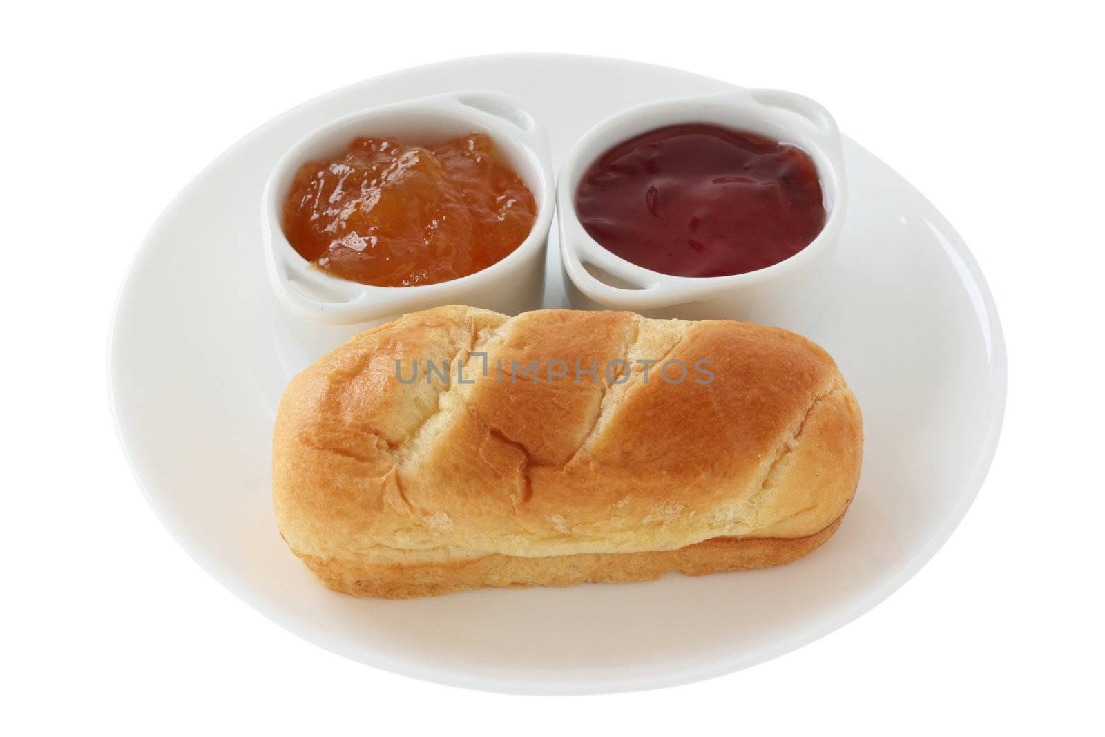 bread with jam in bowls by nataliamylova