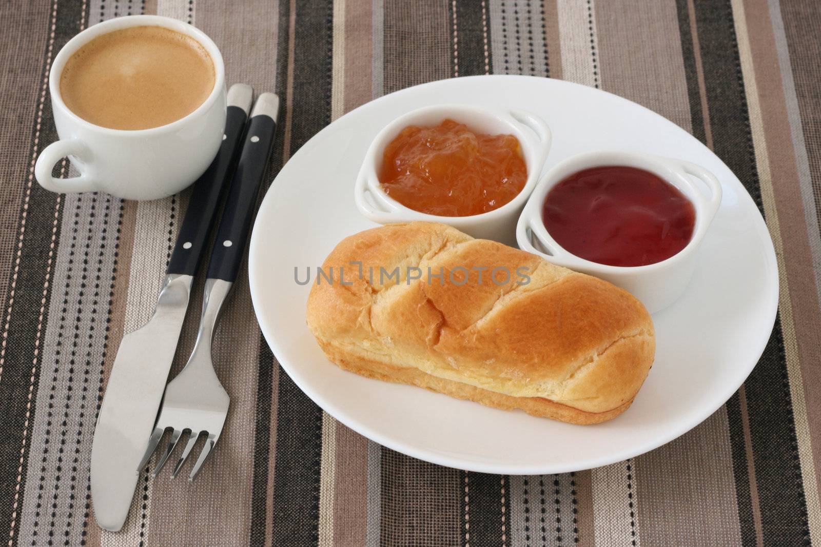 bread with jam in bowls