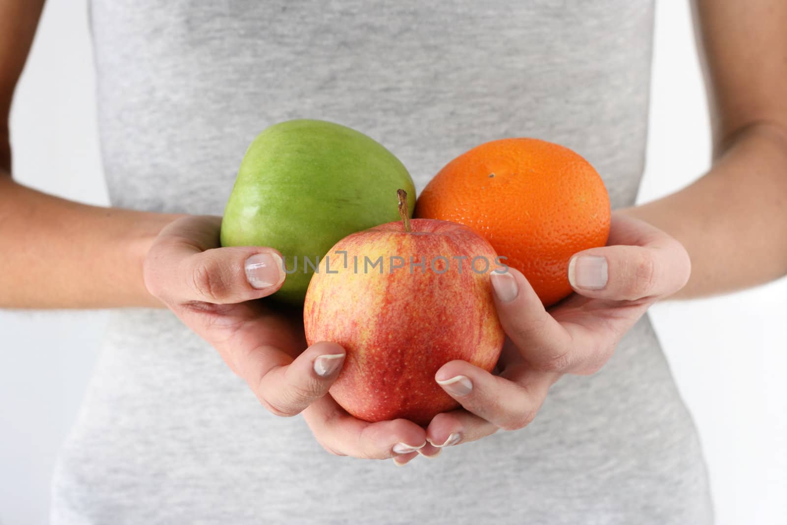 fruits in hands of woman