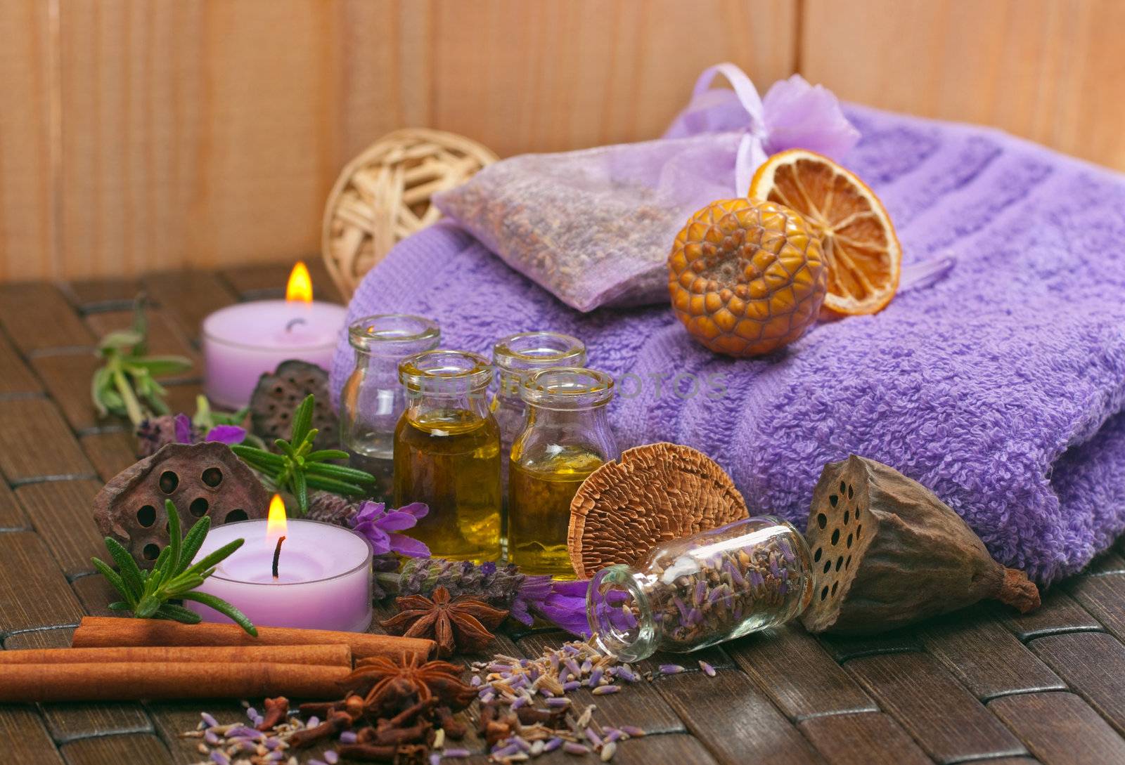 Spa concept with lavender, massage oil, aromatherapy items