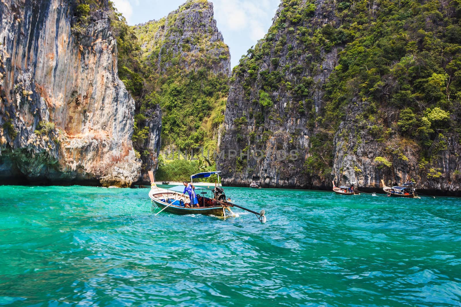 Boats at sea against the rocks in Thailand. Phi Phi Island