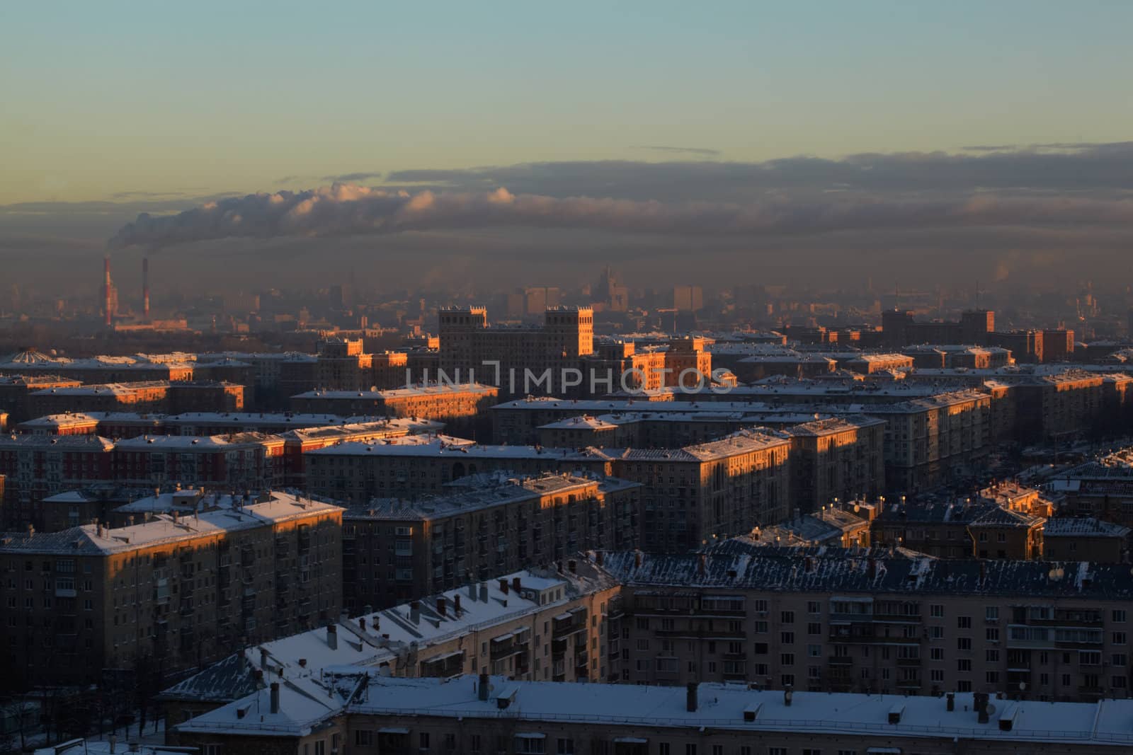 Sunrise over the city. Urban cityscape.