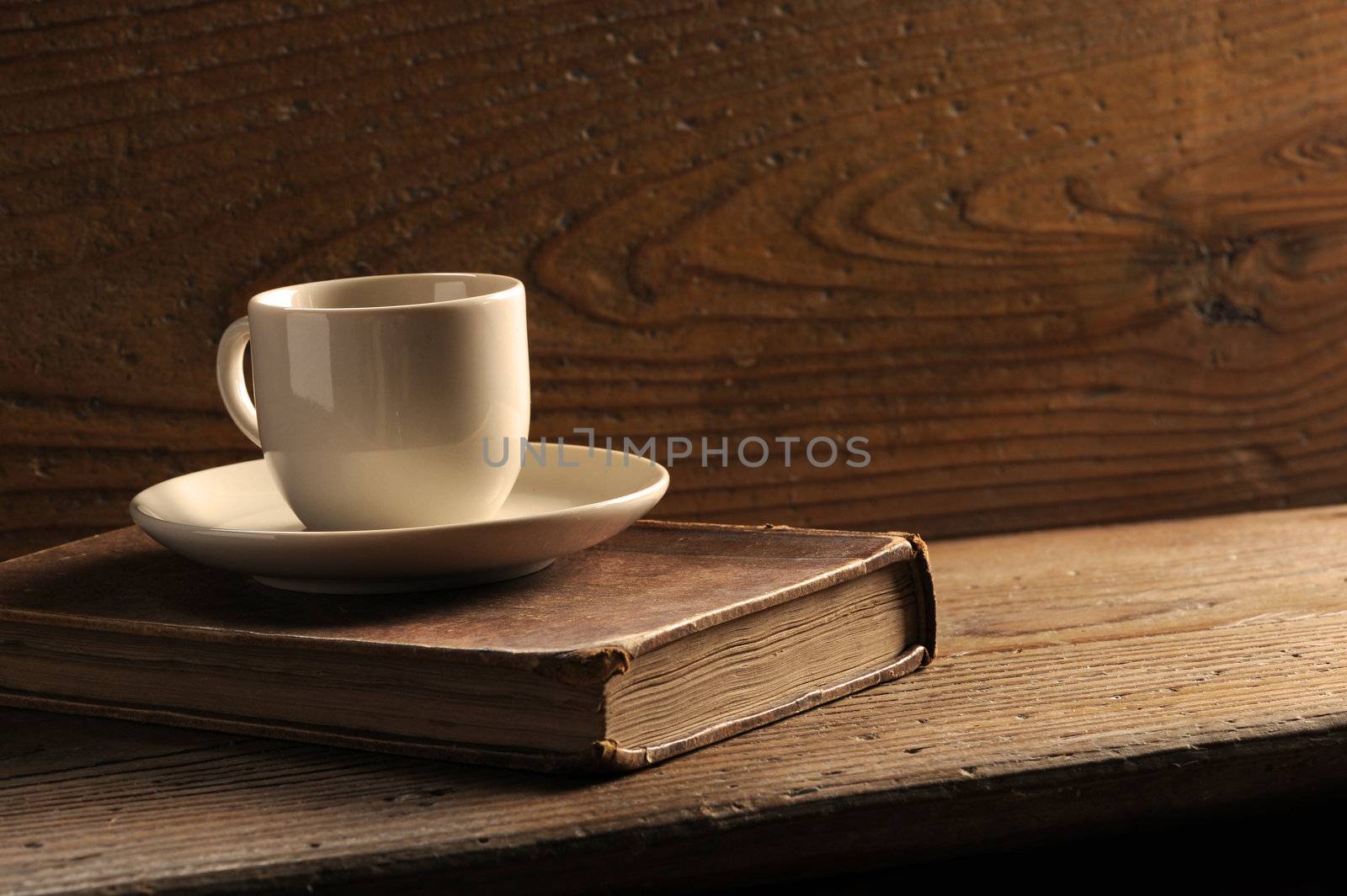 cup of coffee and old books