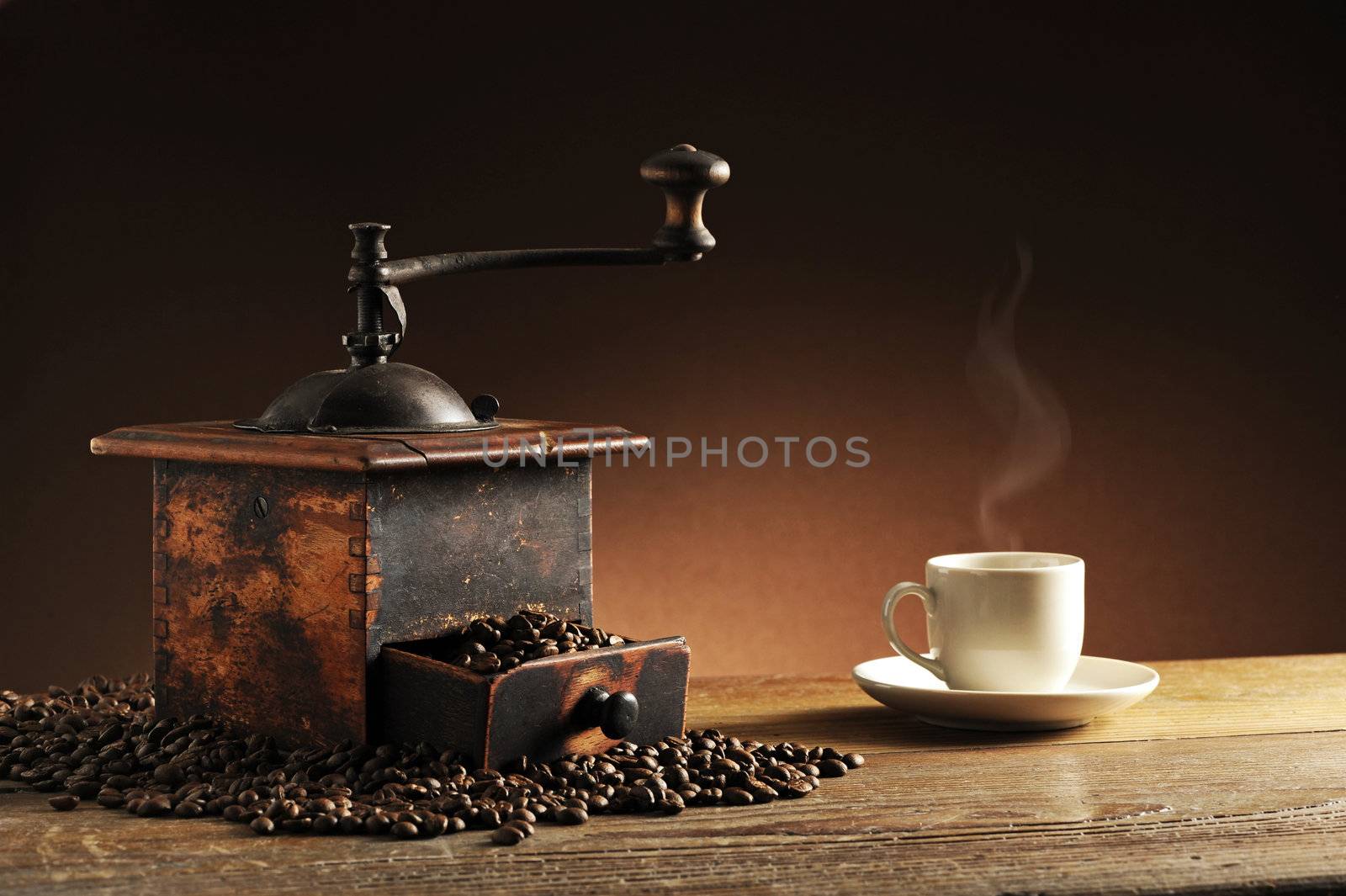 grinder and coffee cup by stokkete