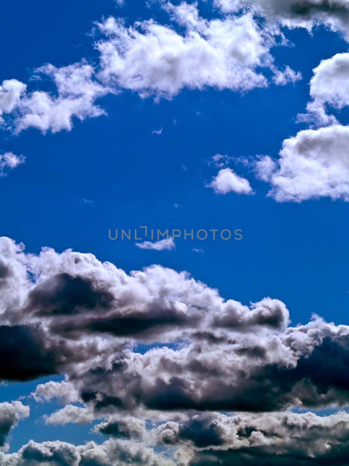 Gray and white clouds on a blue sky