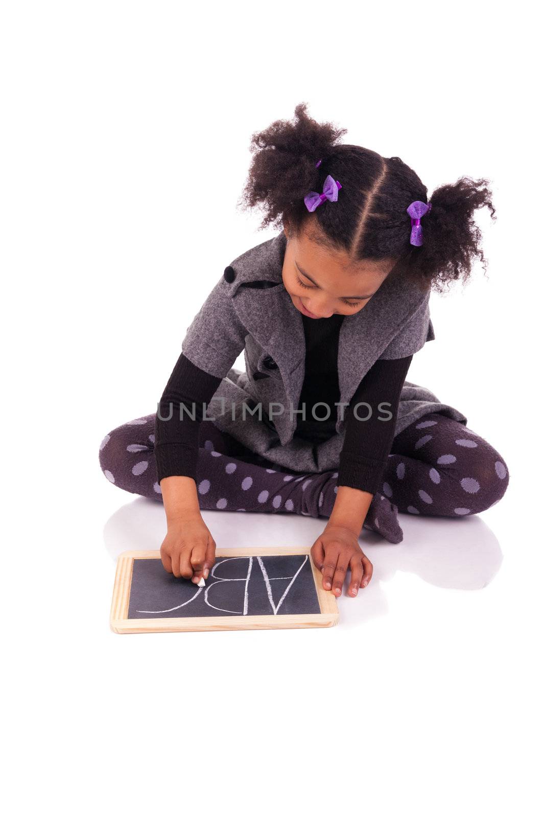 young African girl with a black slate