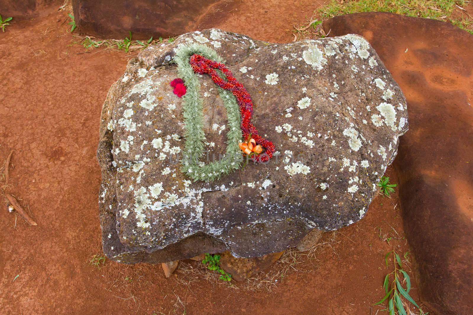 Leis on Hawaiian Birthing Stones by joshuaraineyphotography