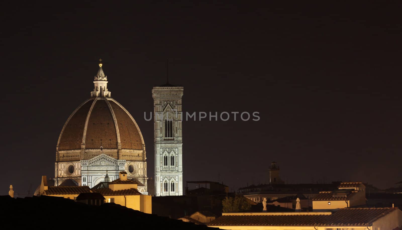 The skyline of Florence, Italy at night.  Featuring the Duomo and Giotto's Bell tower.