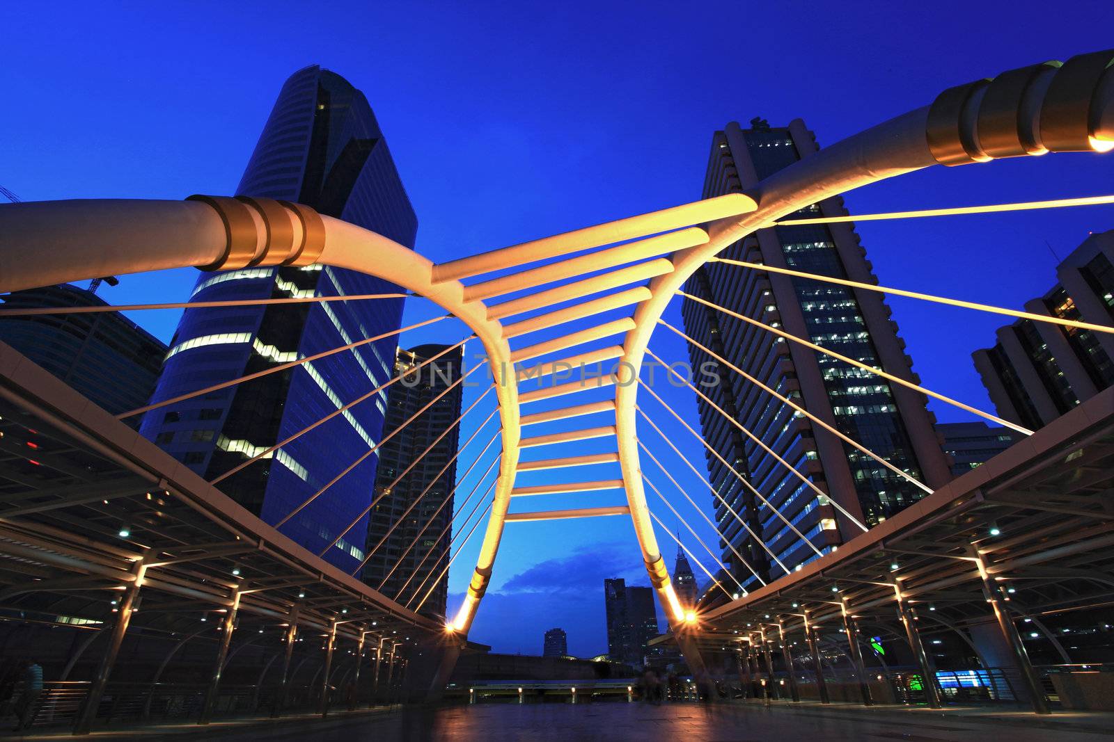 skywalk at bangkok downtown square night in business zone 