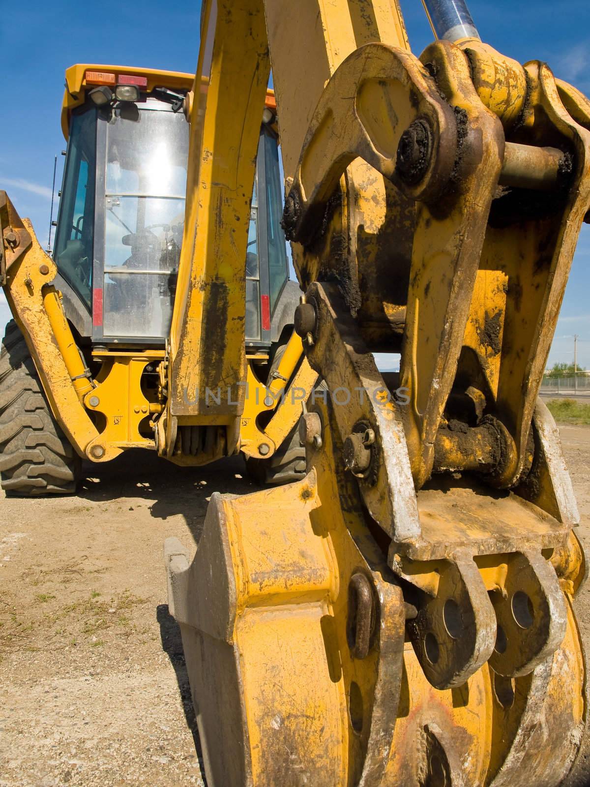 Heavy Duty construction equipment parked at work site 