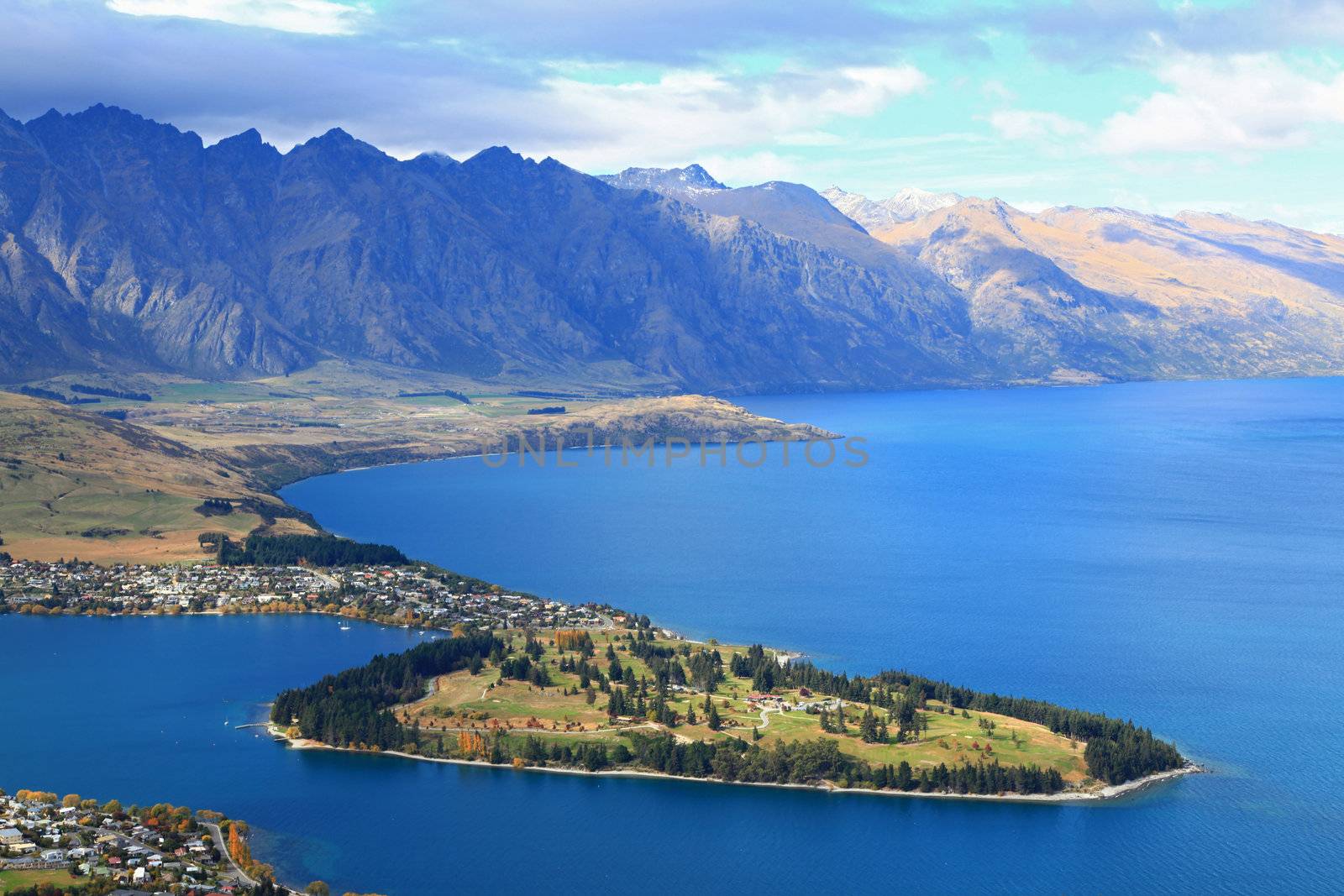 closeup of queenstown with lake Wakatipu from top at noon.