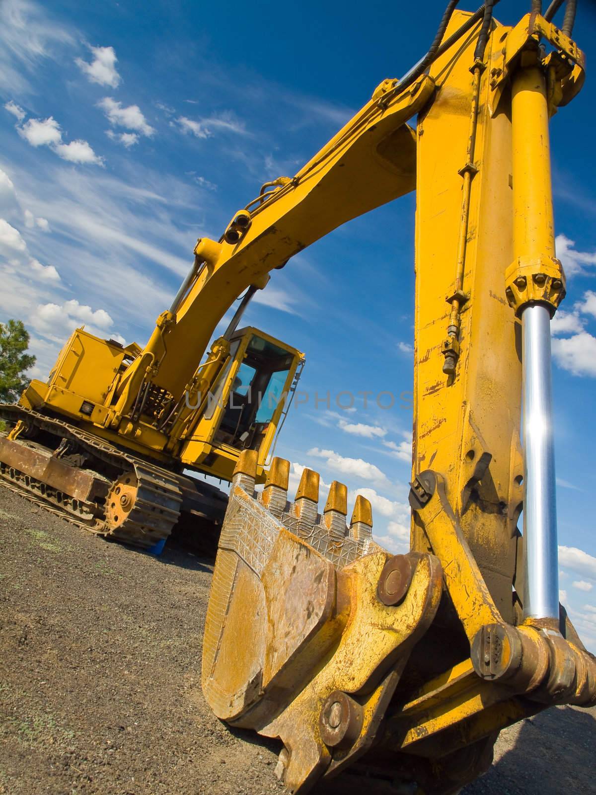 Heavy Duty Construction Equipment Parked at Worksite 