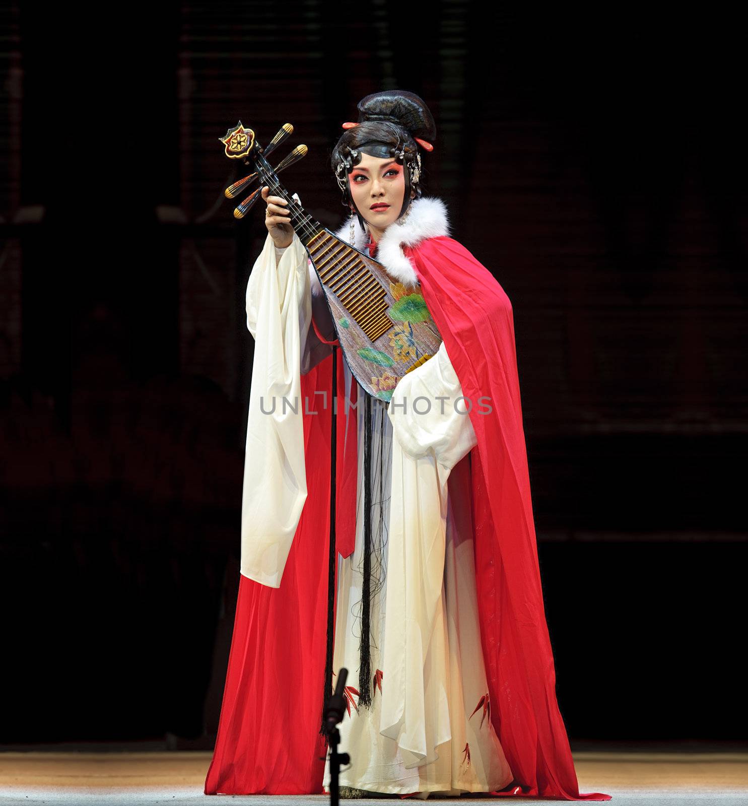 CHENGDU - JUN 4: chinese Sichuan opera performer make a show on stage to compete for awards in 25th Chinese Drama Plum Blossom Award competition at Xinan theater.Jun 4, 2011 in Chengdu, China.
Chinese Drama Plum Blossom Award is the highest theatrical award in China.