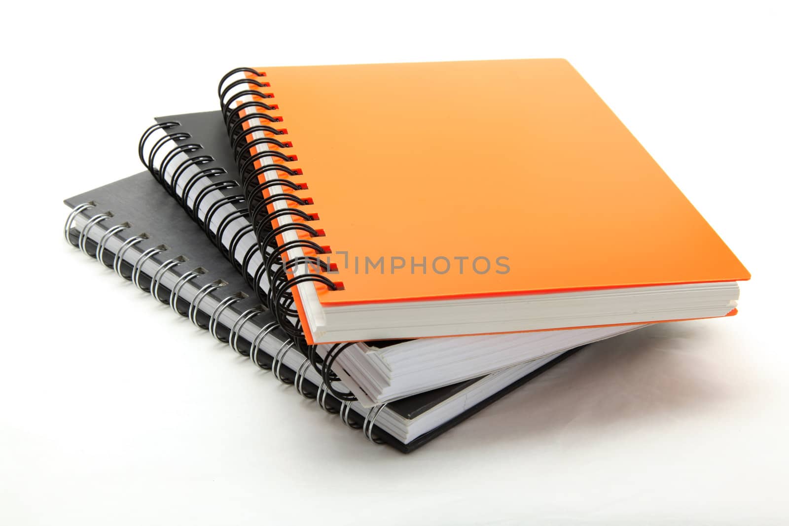 stack of ring binder book isolated on white