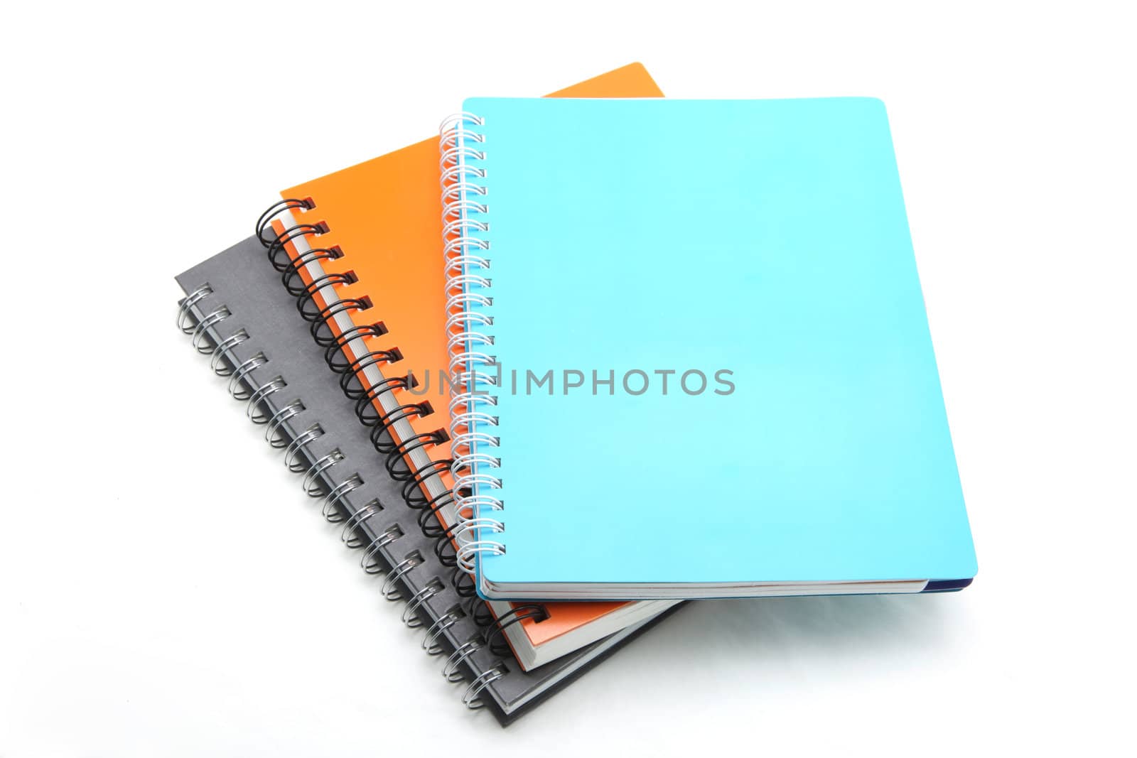 stack of ring binder book isolated on white by vichie81