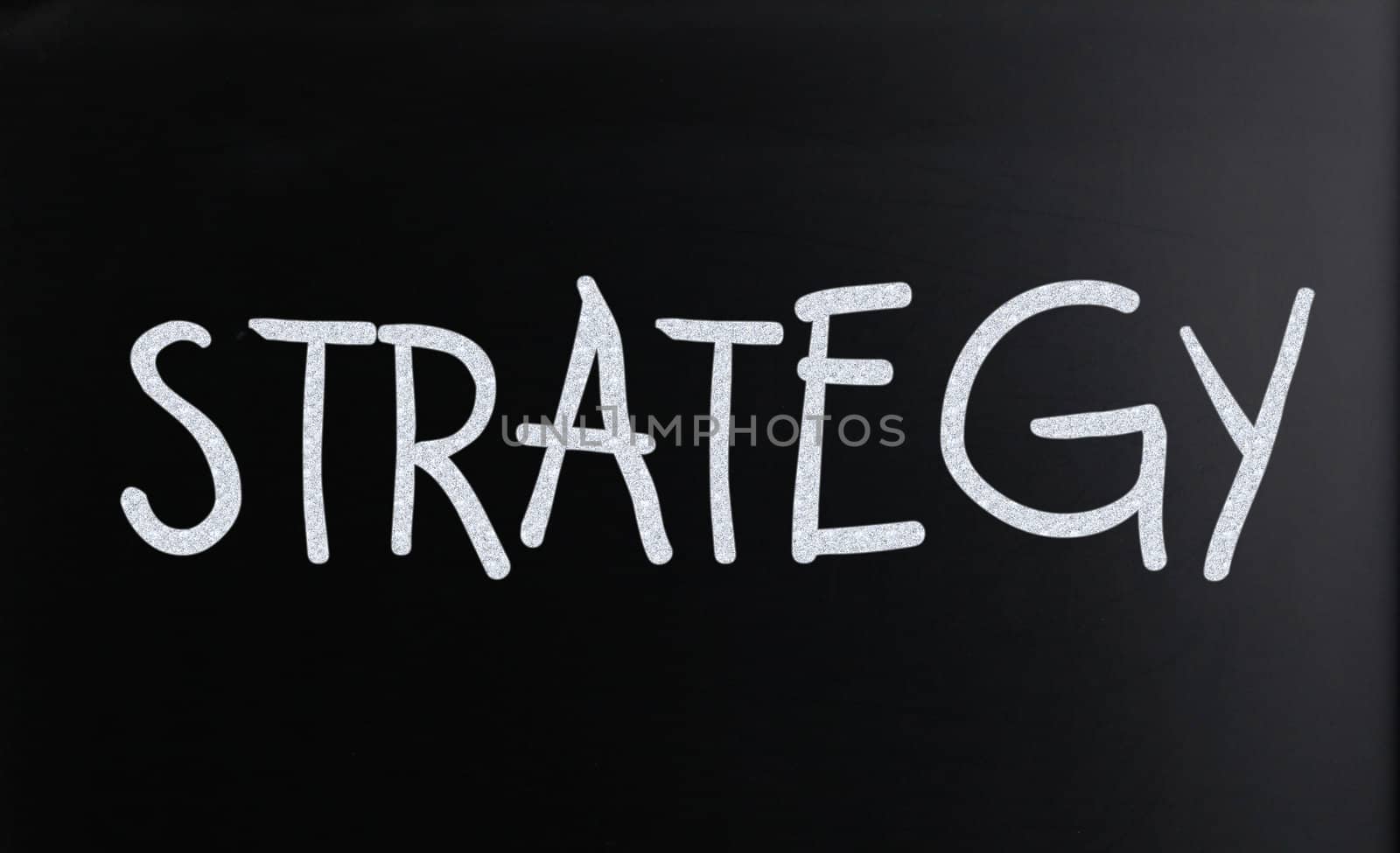 The word "Strategy" on a blackboard
