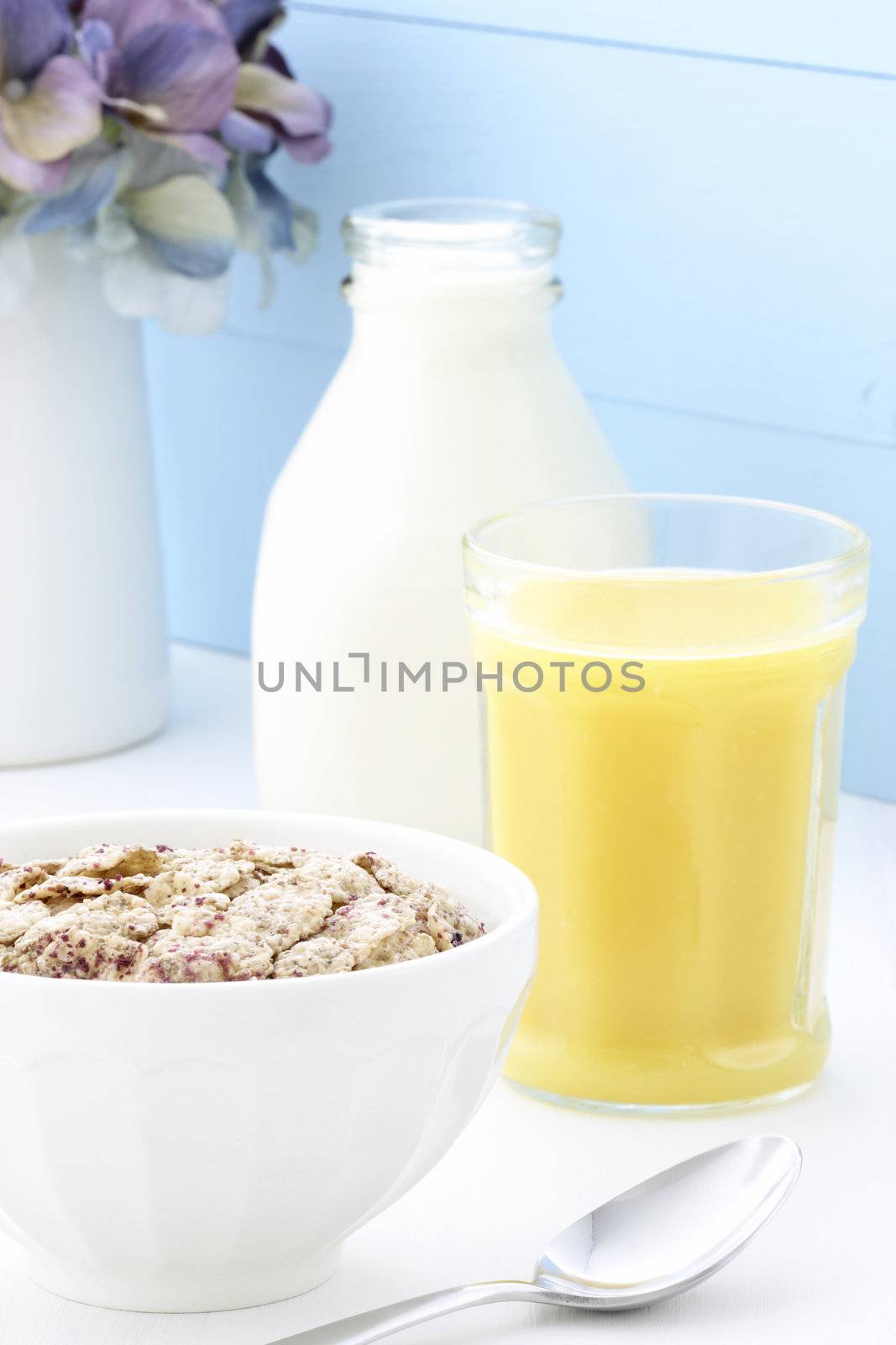 Delicious and healthy breakfast cereal with orange juice