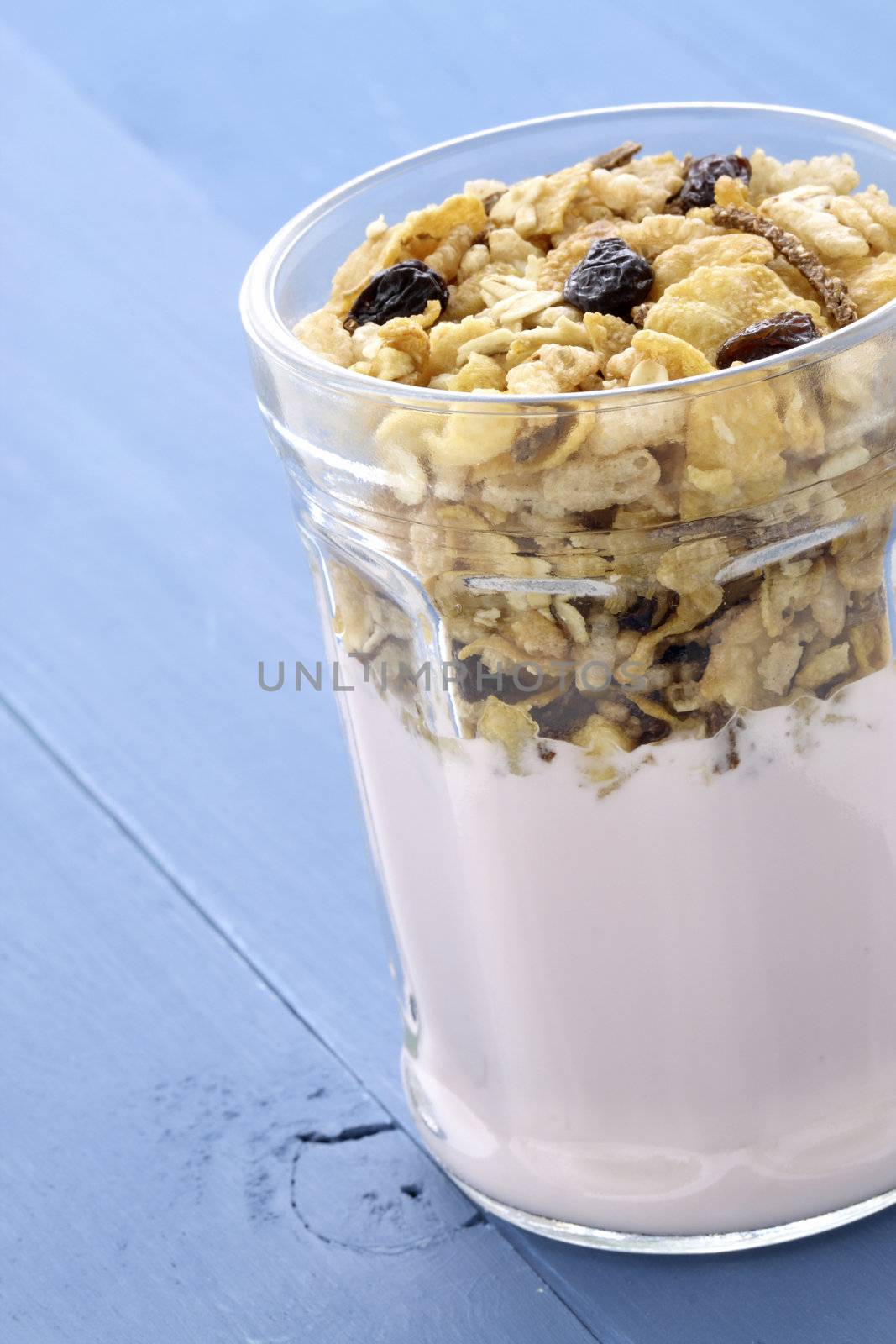 Fresh, healthy and delicious yogurt parfait in vintage French jar, the perfect breakfast, snack or dessert.