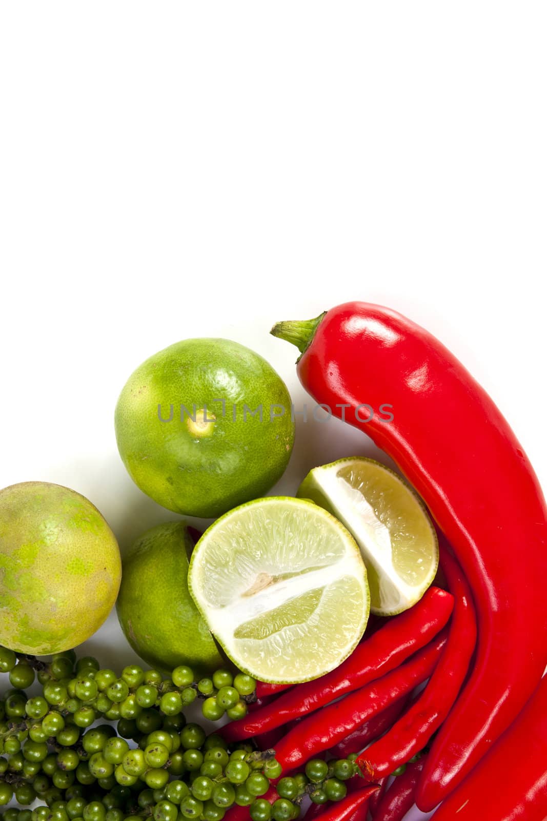Mix food ingredient chili peppercone and lime on the white background with blank text message copy space