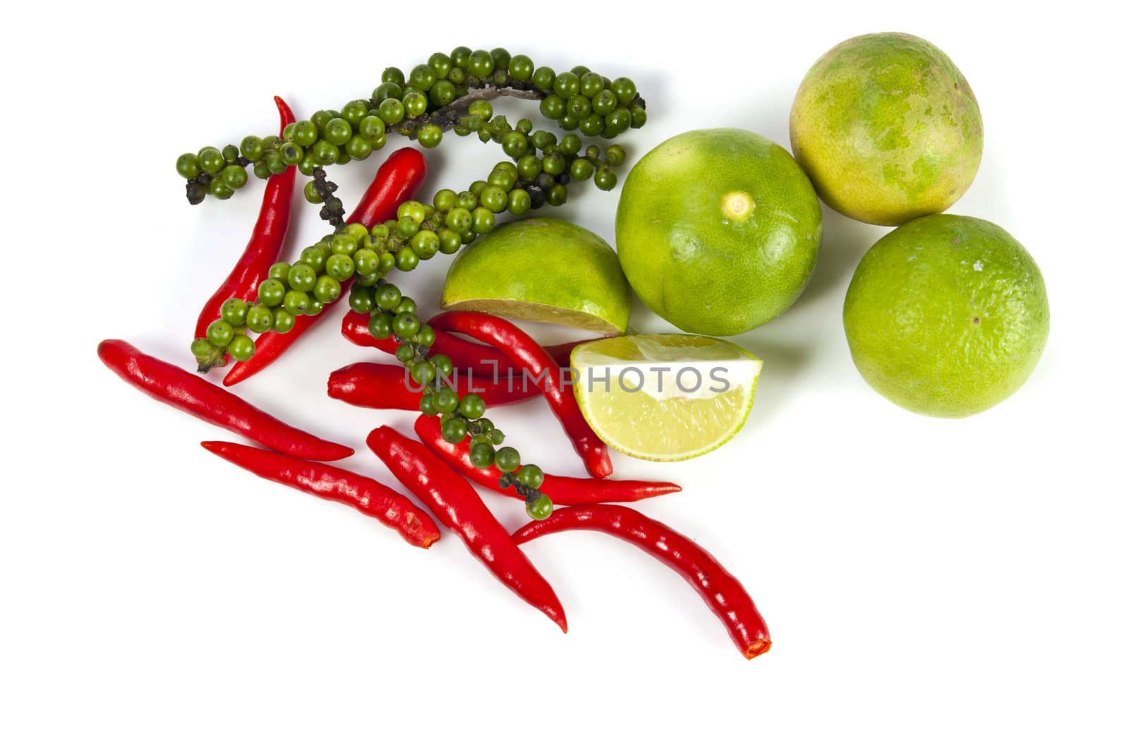 Mix food ingredient chili peppercone and lime on the white background