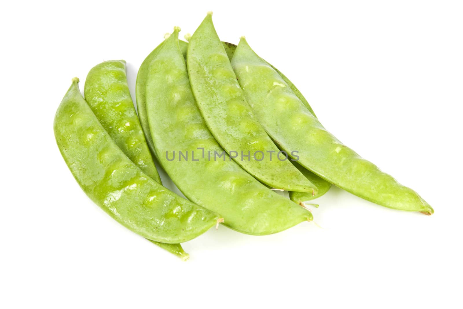 Fresh green pea on the white background