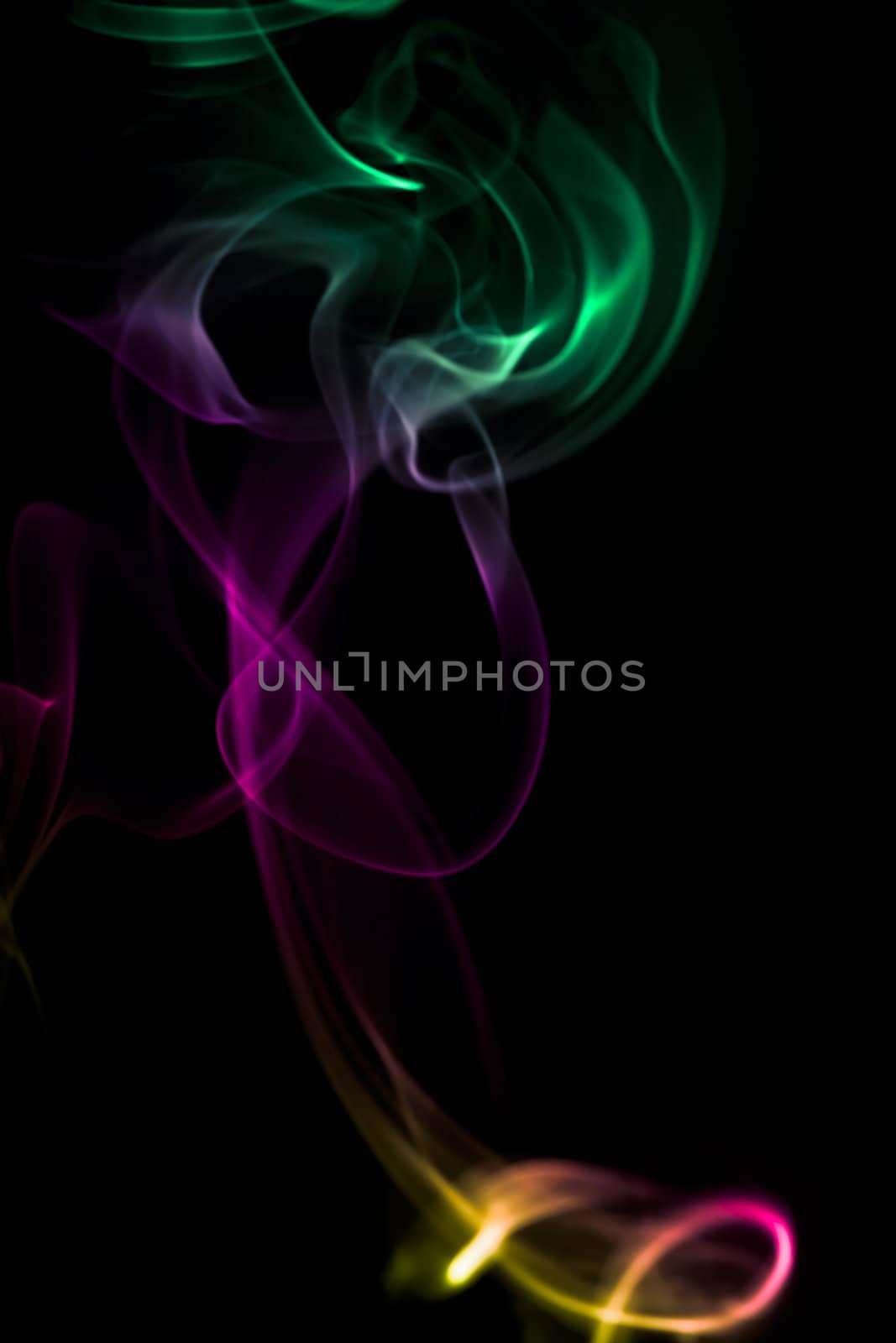 Multi color abstract smoke on black