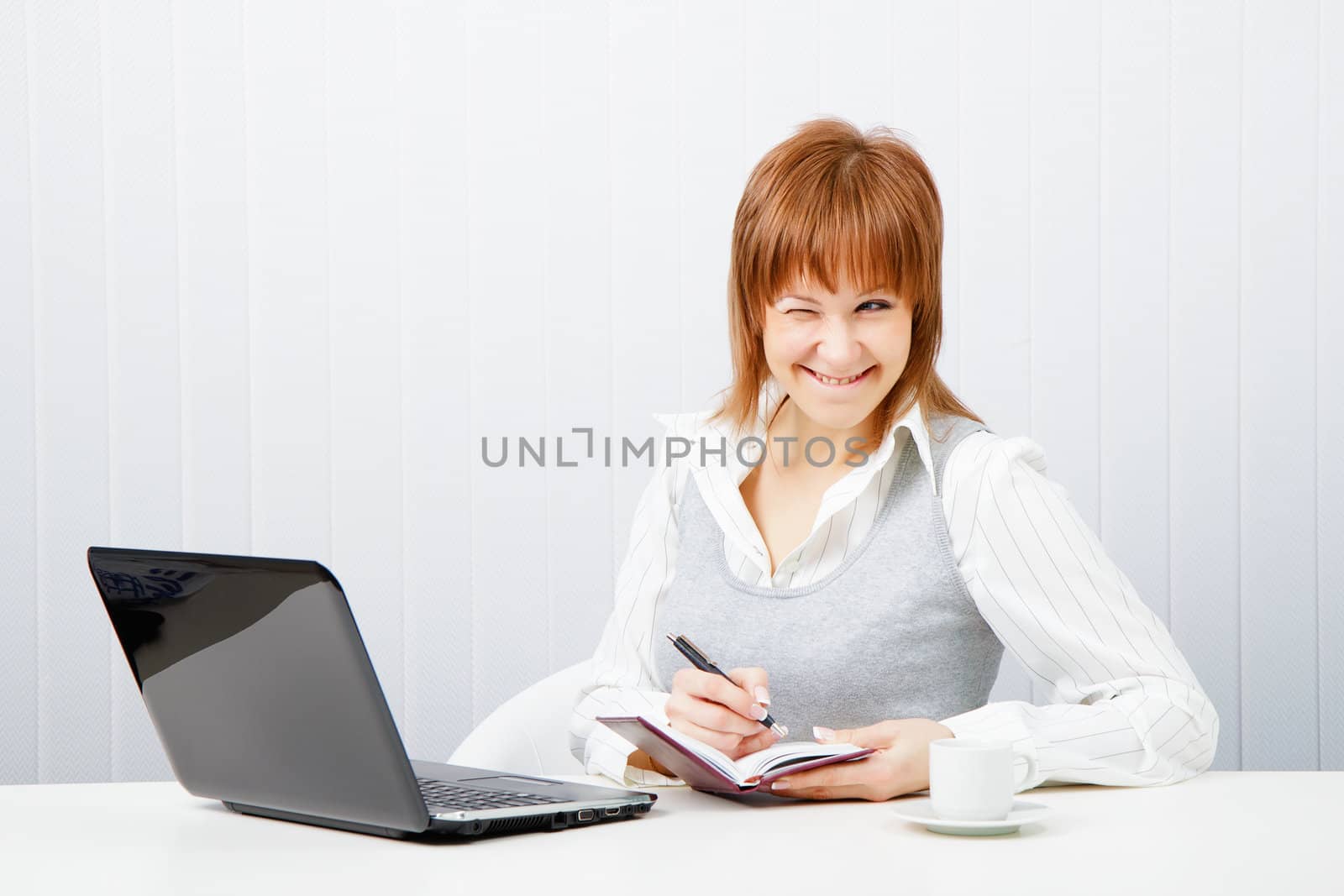 smiling attractive girl with a notebook. Office worker by pzRomashka