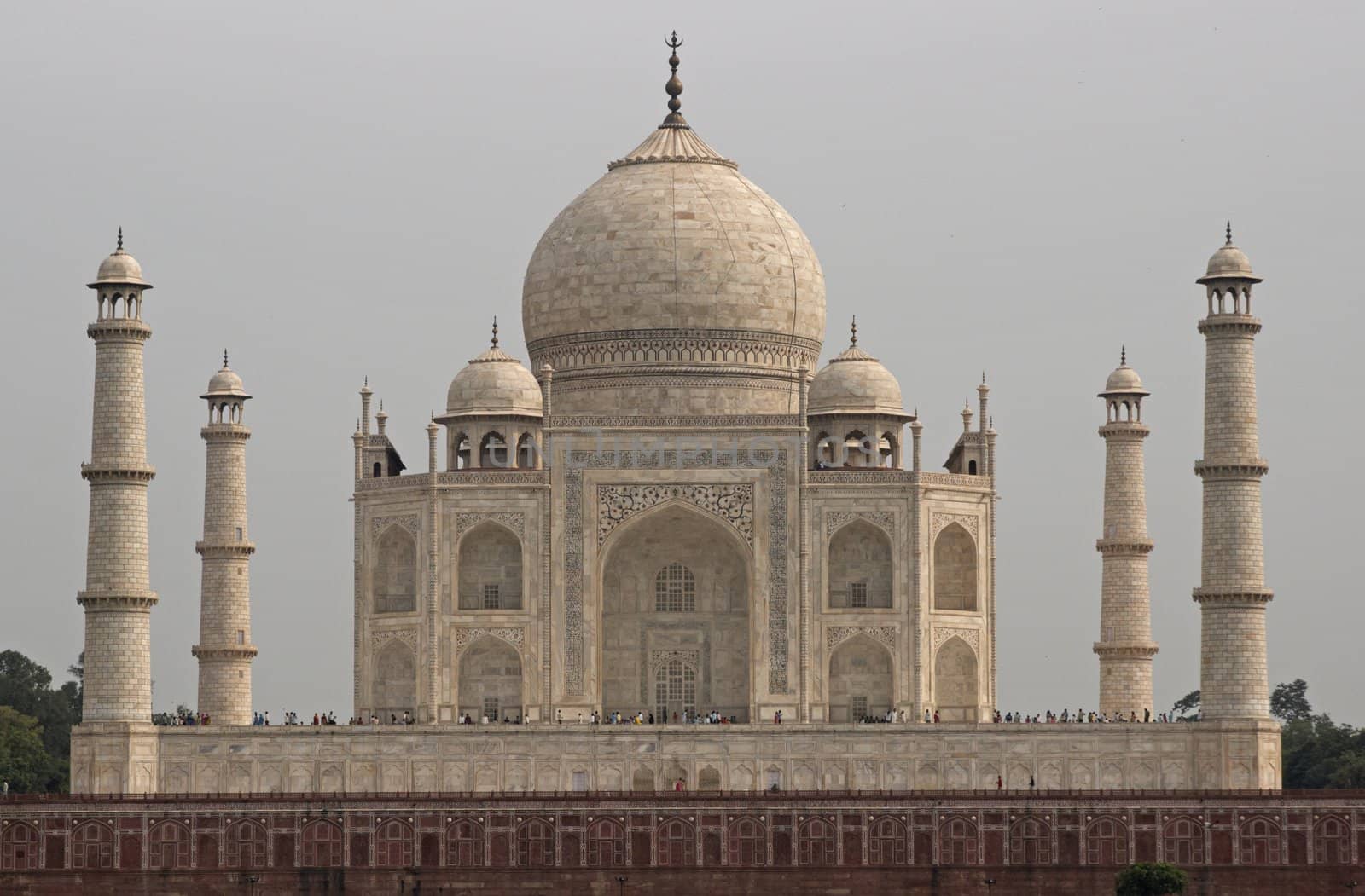 Taj Mahal. White marble tomb set on raised platform topped by large oval dome. Agra, Uttar Pradesh. India