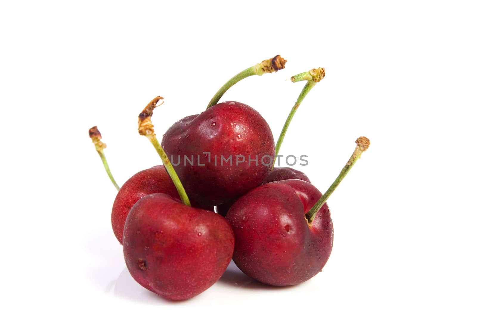 Group cherries with dewdrop on white background