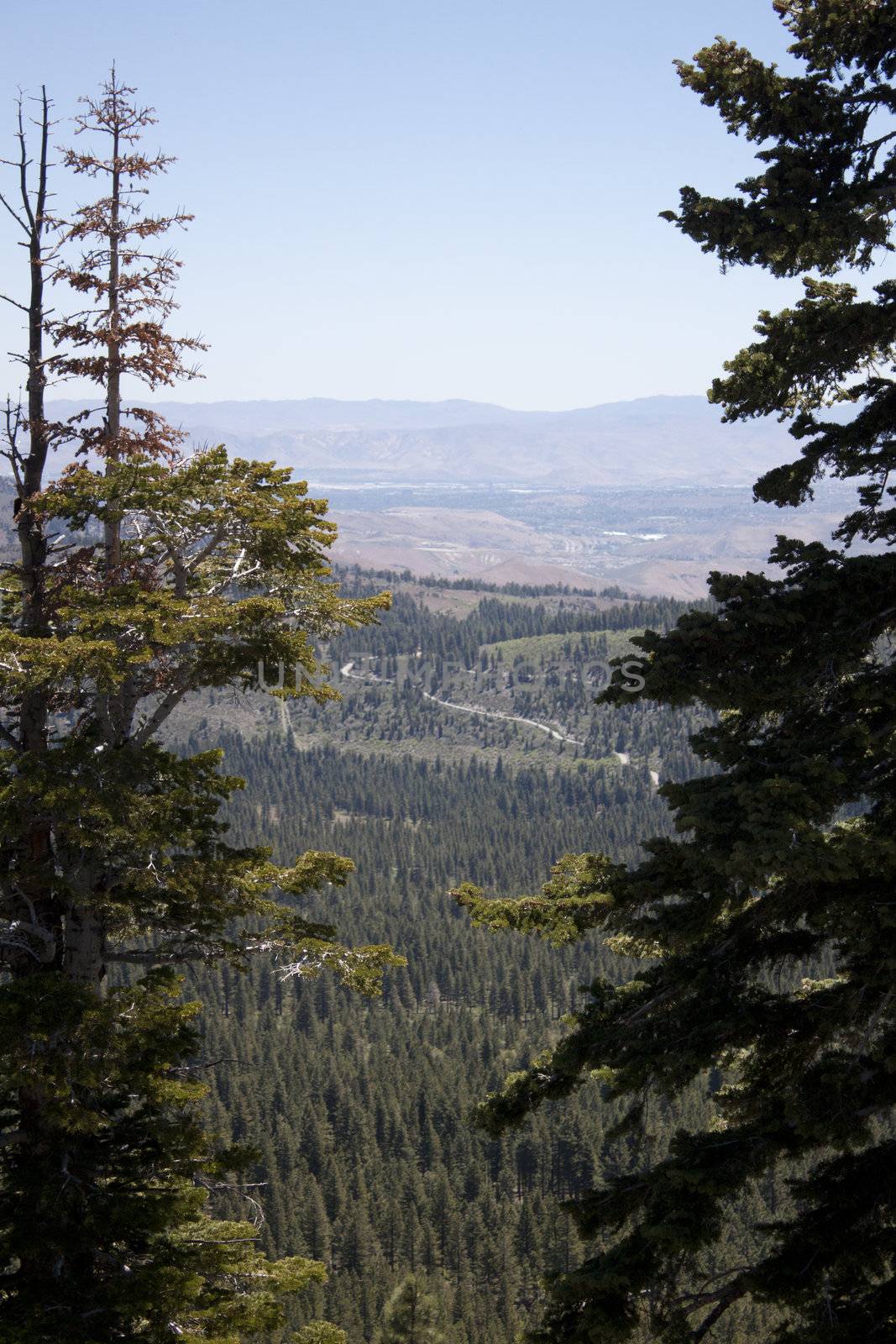 High angle of the Sierra Nevadas with blue sky and granite