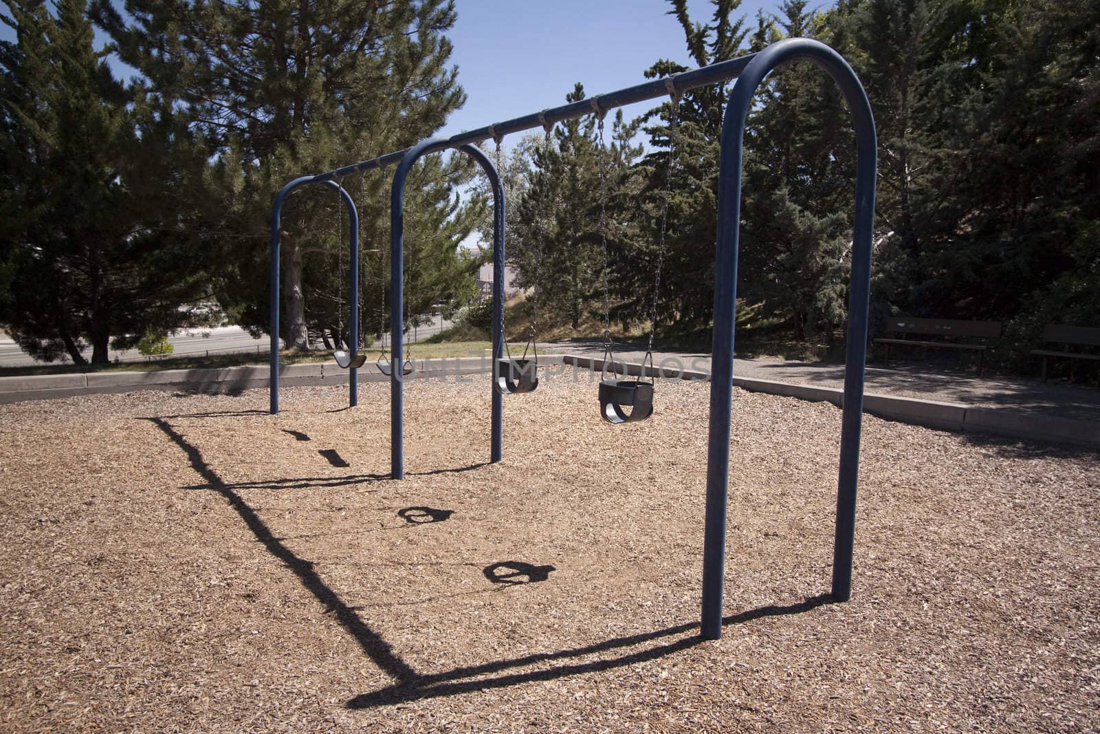 Playground on a clear summer day. Empty with no kids