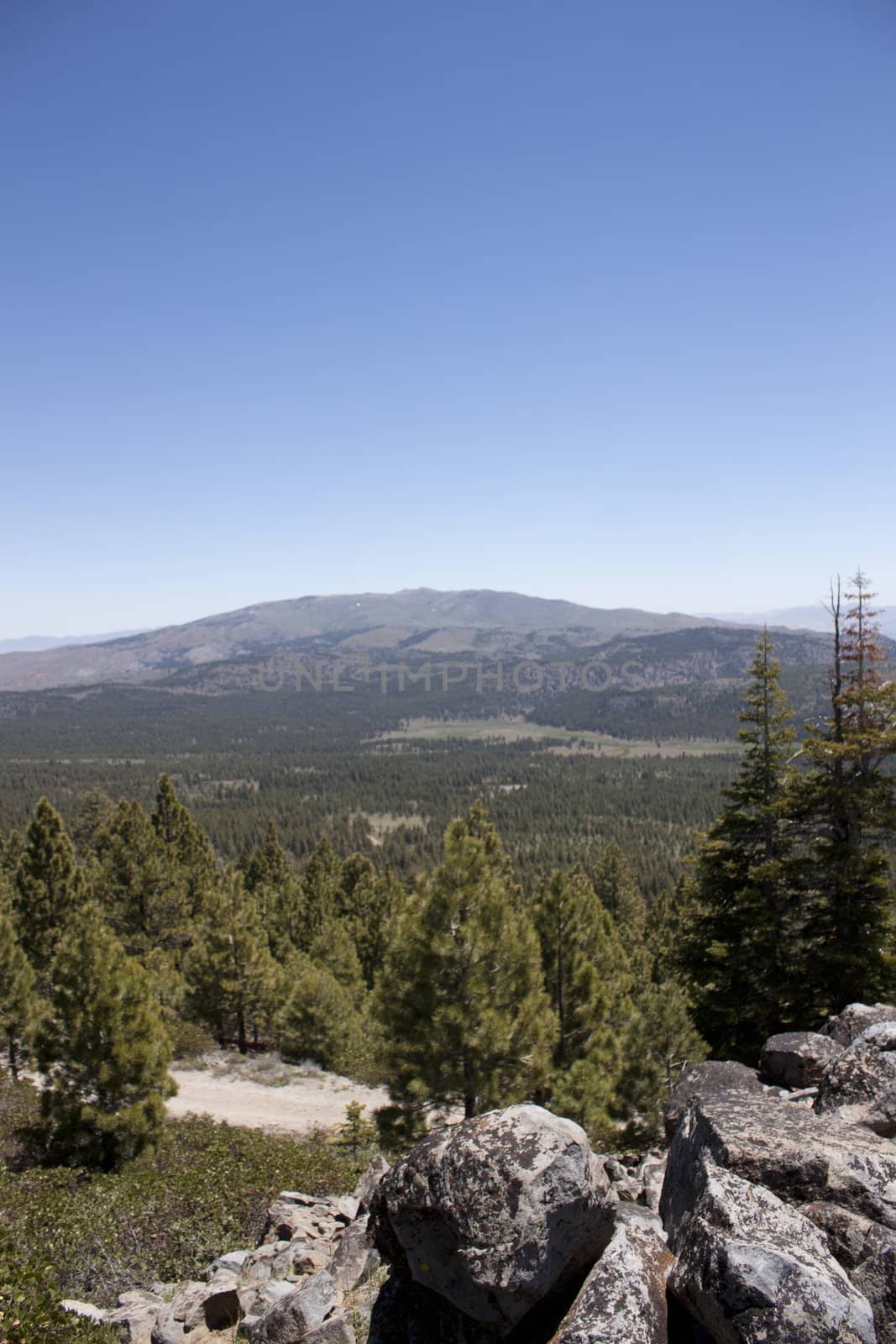 High angle of the Sierra Nevadas with blue sky and granite