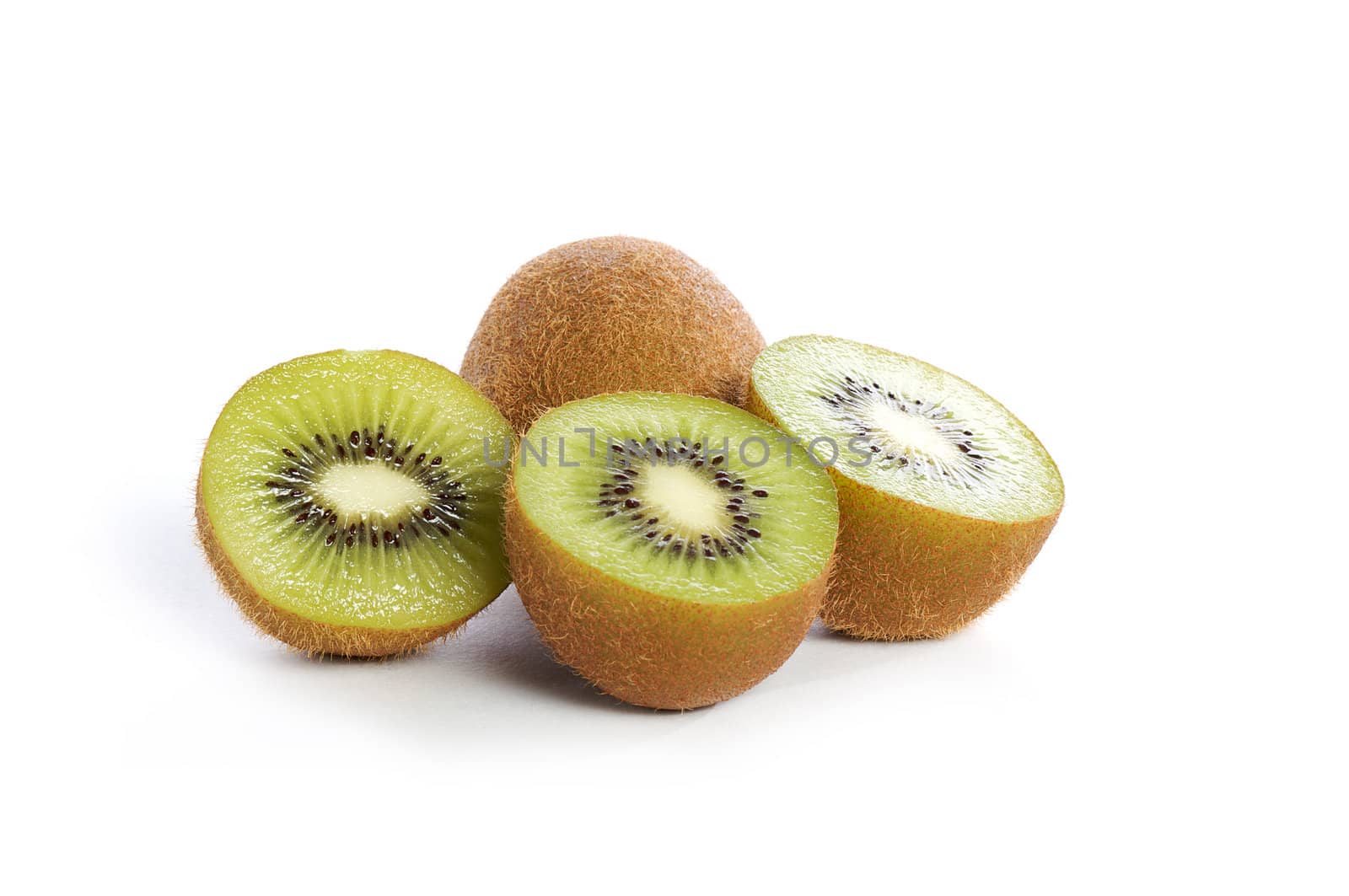 Set of cut kiwis isolated on white