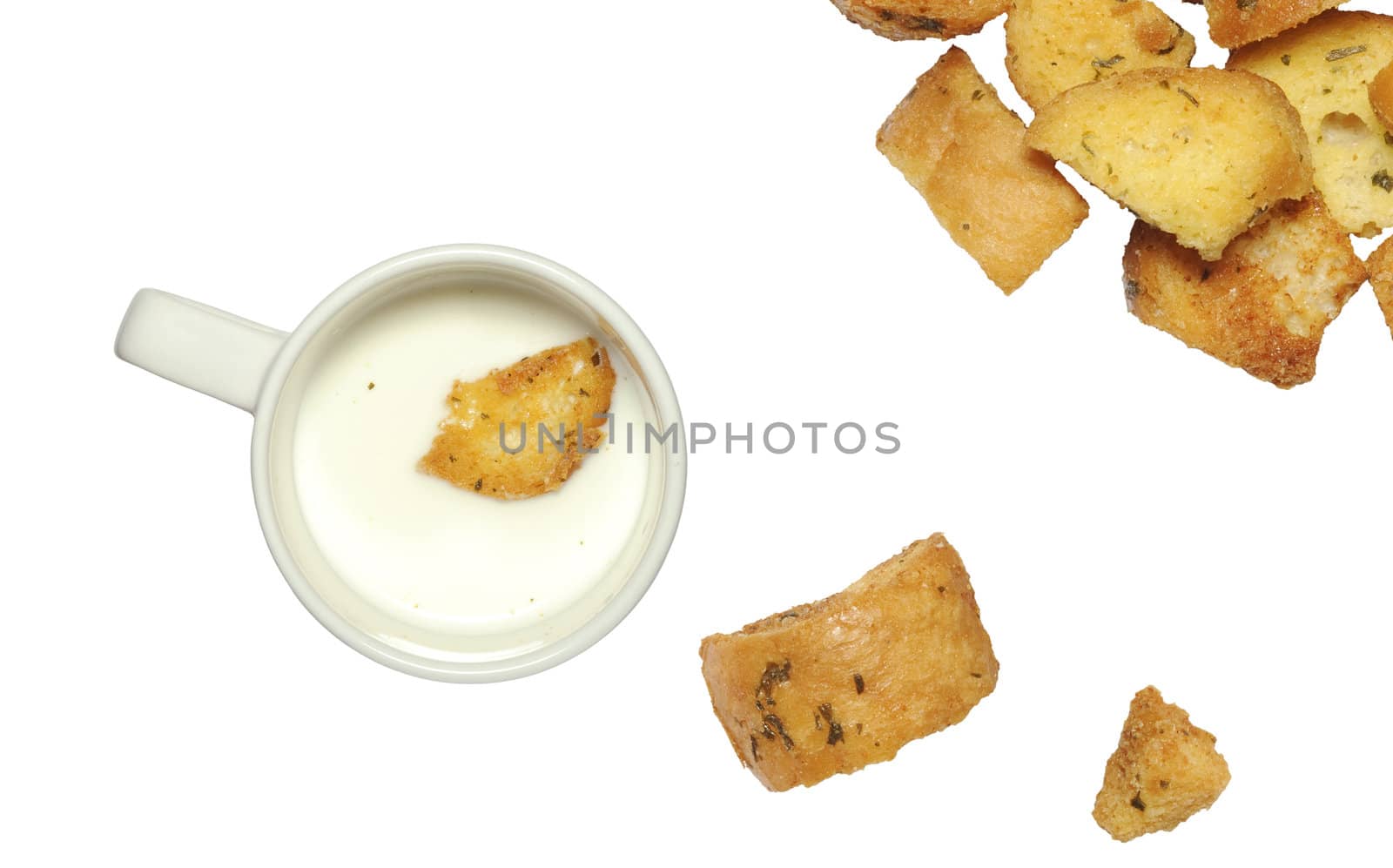 closeup of delicious bread croutons and milk by jackq