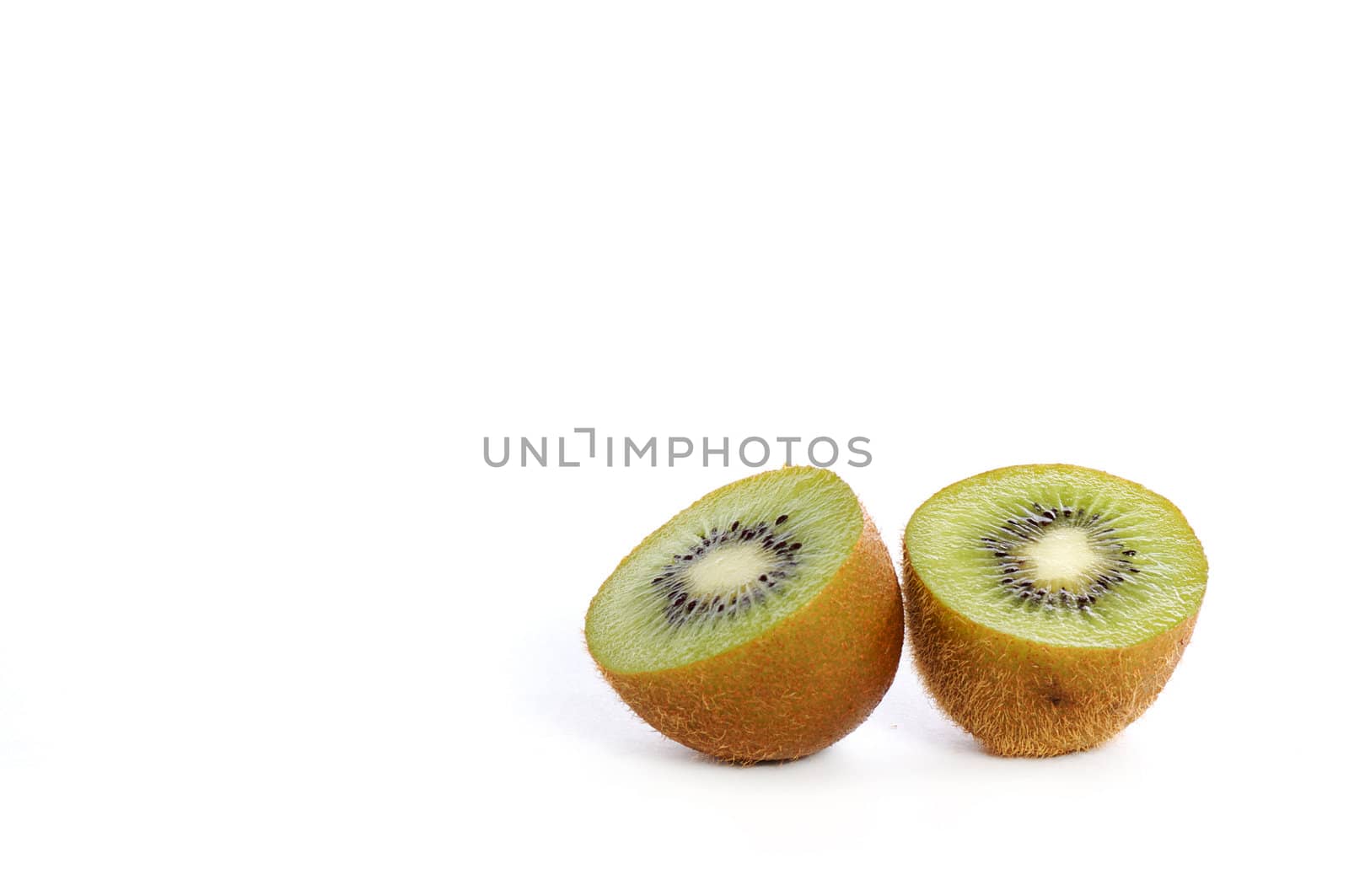 Set of cut kiwis isolated on white