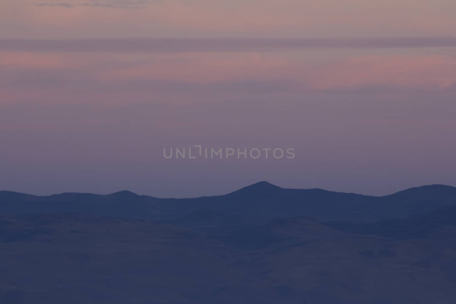 Mountain range and sky at dusk. excelletn for copyspace or backdrops.