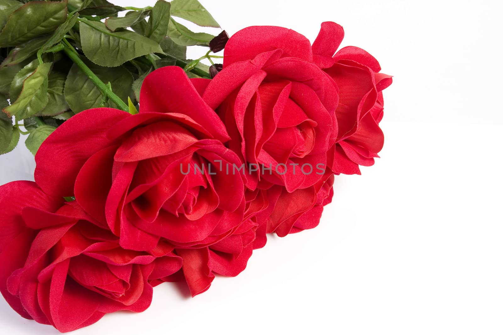 Fabric rose bouquet on isolated white