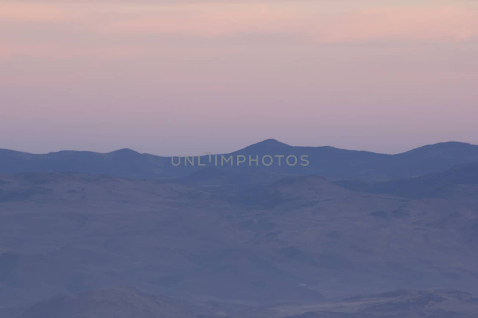 Mountain range and sky at dusk. excelletn for copyspace or backdrops.