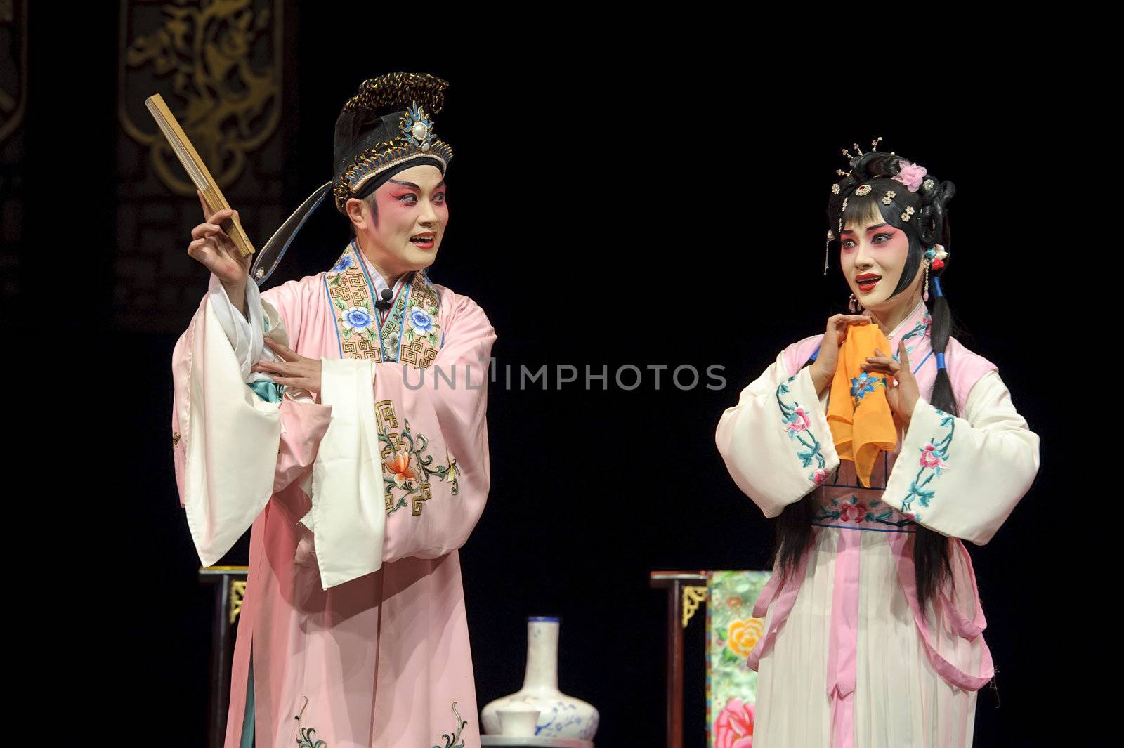 pretty chinese traditional opera actress with theatrical costume