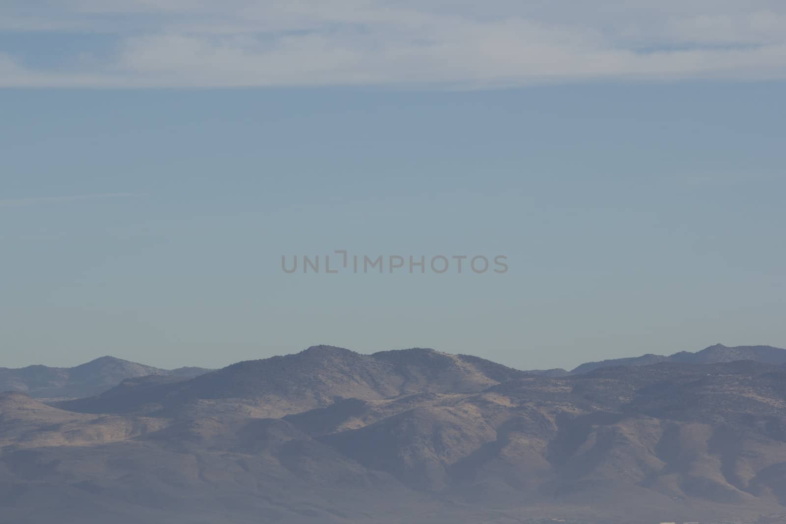 Mountain range with sky by jeremywhat