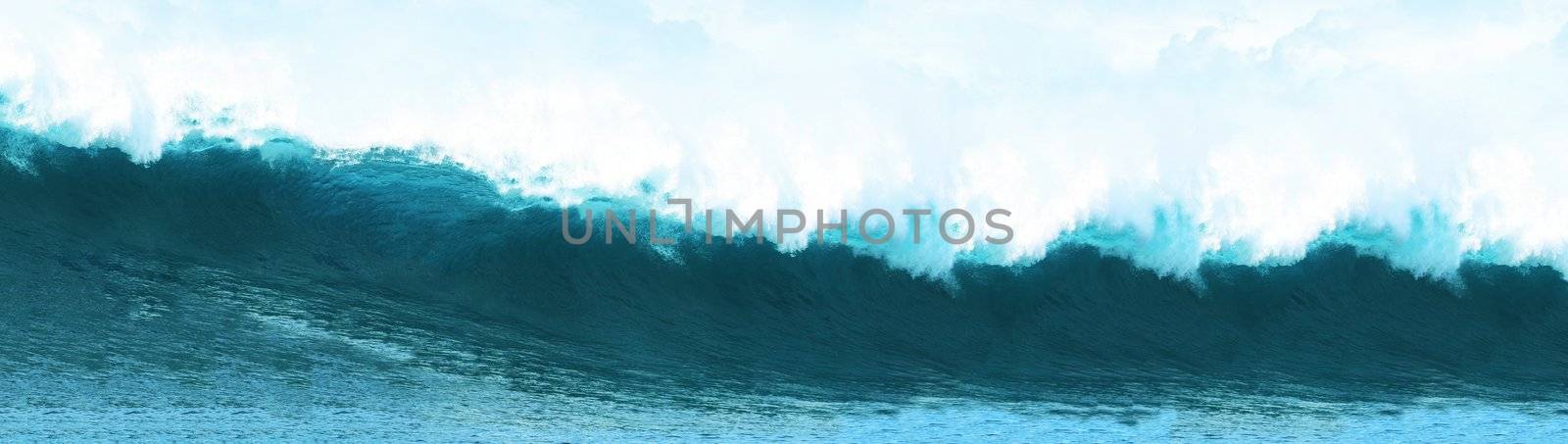 Big Blue Surfing Wave Breaks in Ocean by ozaiachin