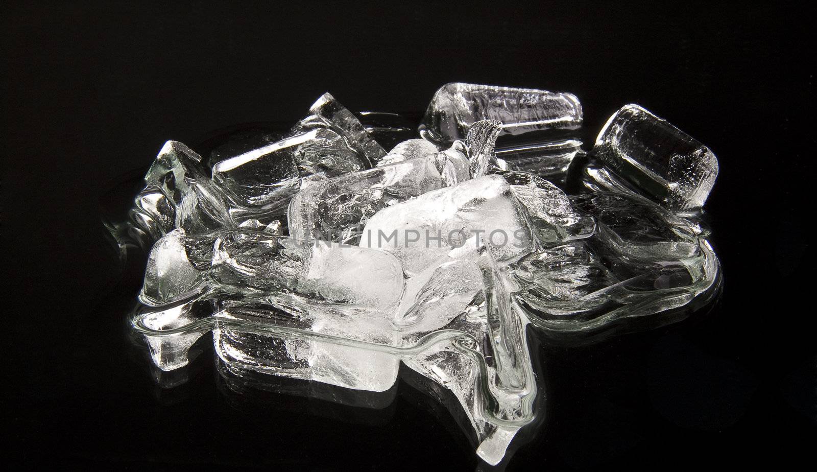 Cubes of ice on a black background