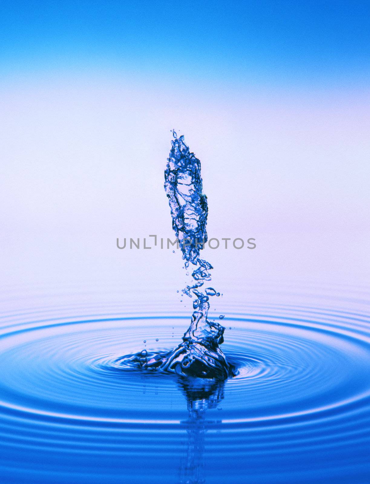 Water splash background close up isolated blue