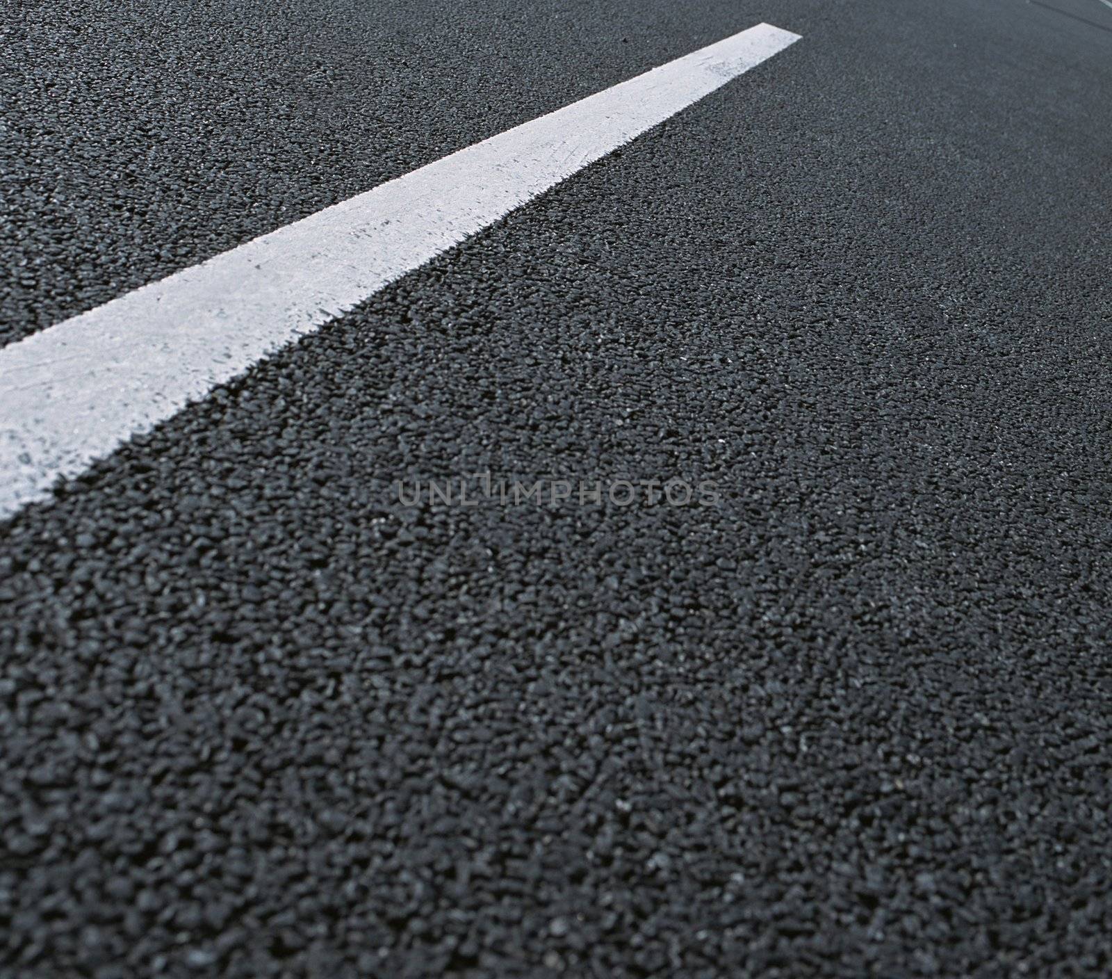 asfalt road close up isolated on grey background