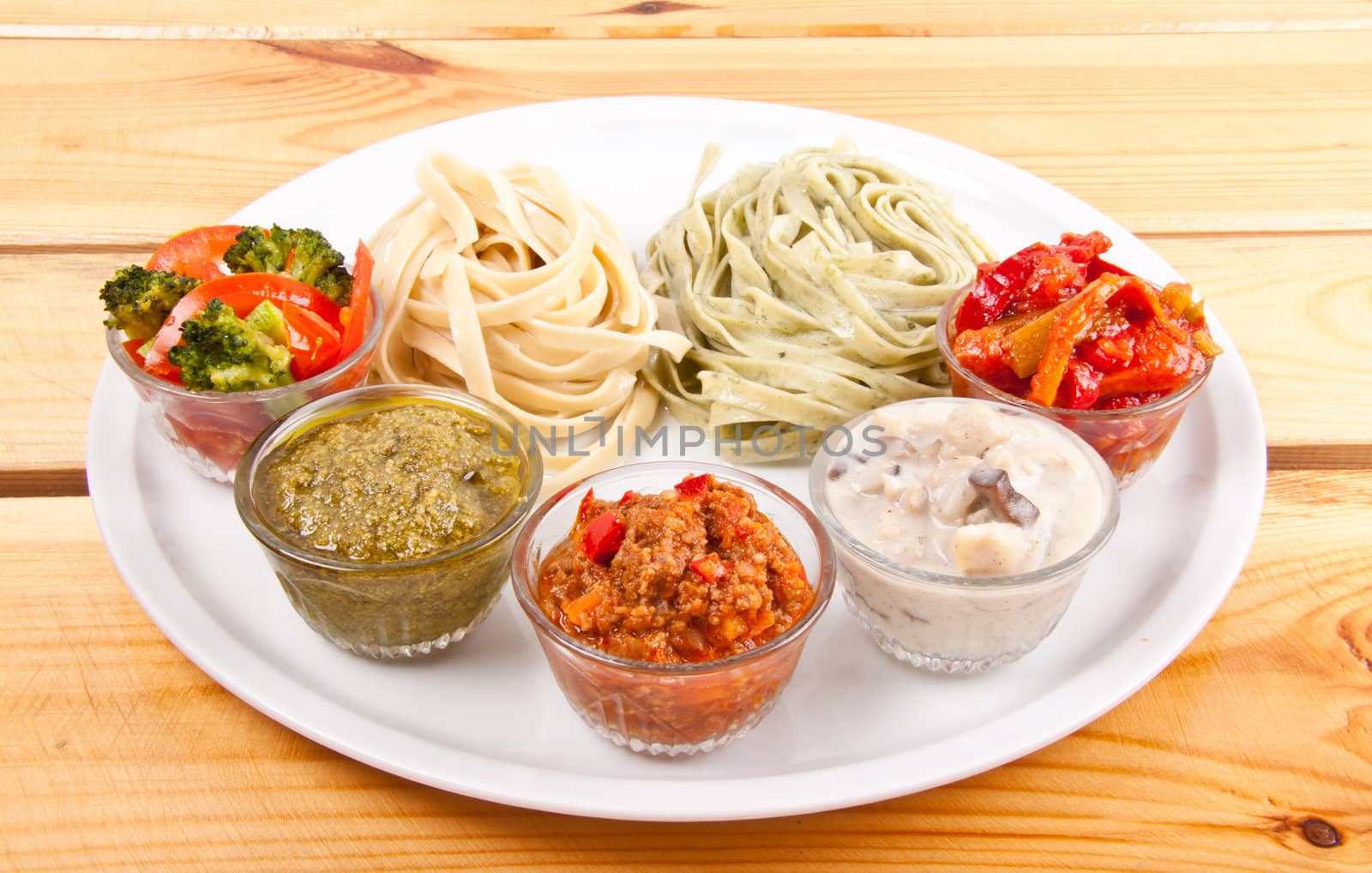 two italian tagliatelles and five various condiments by ozaiachin