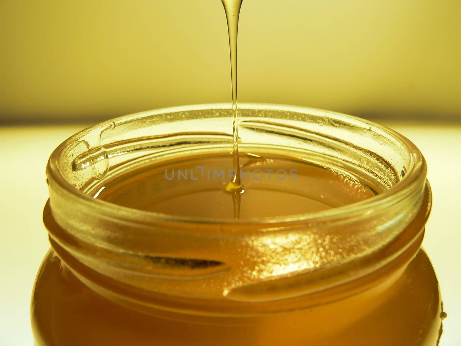 honey on a yellow background