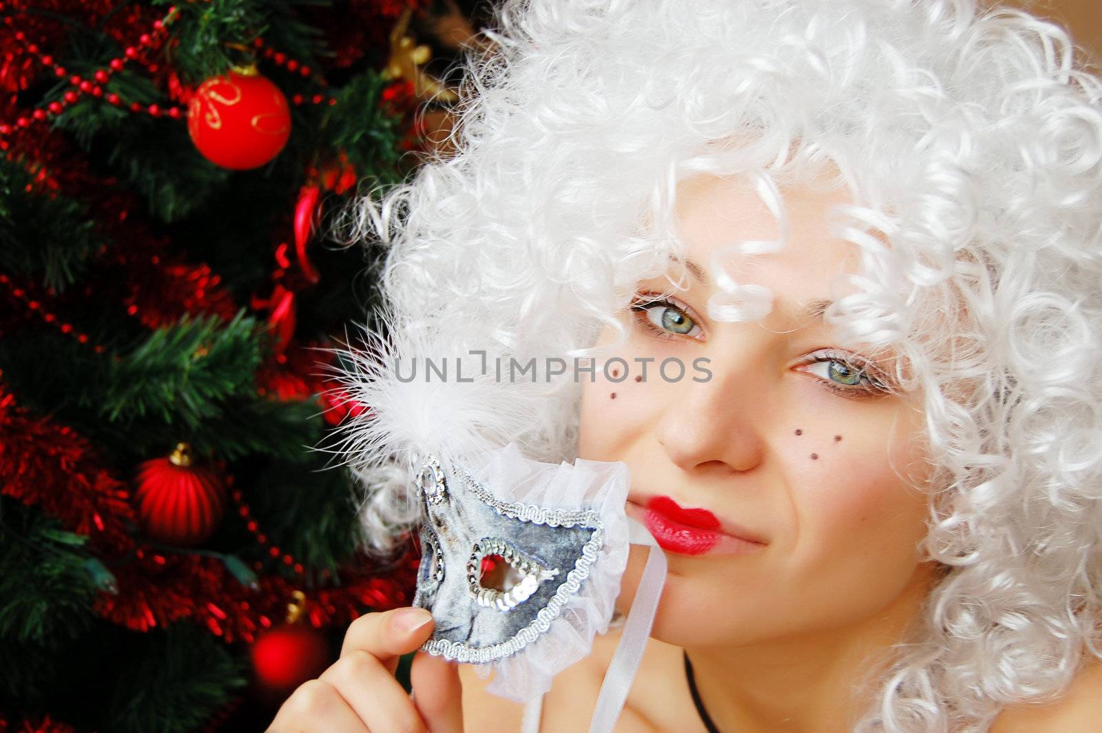 Funny girl in white twig like with mask