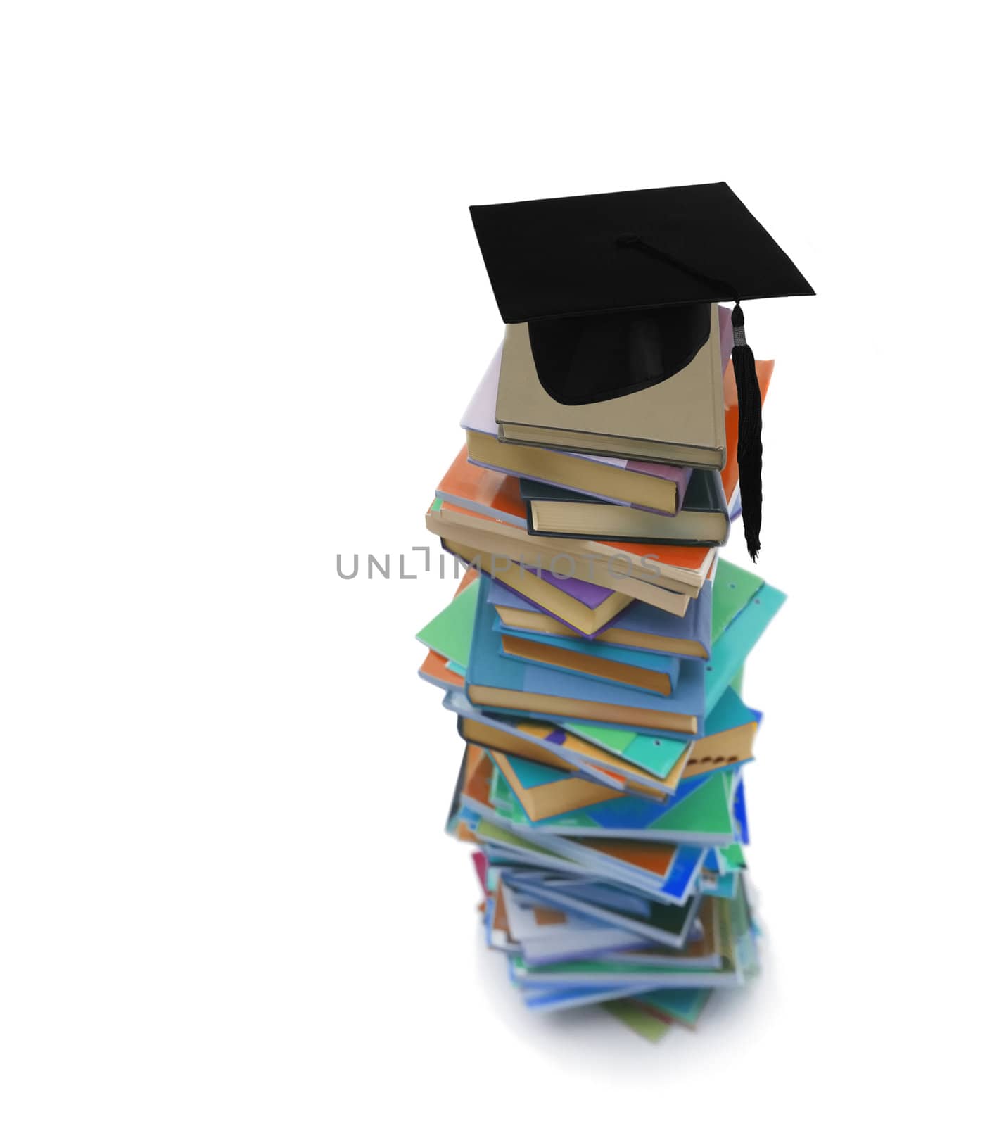 Student hat on books