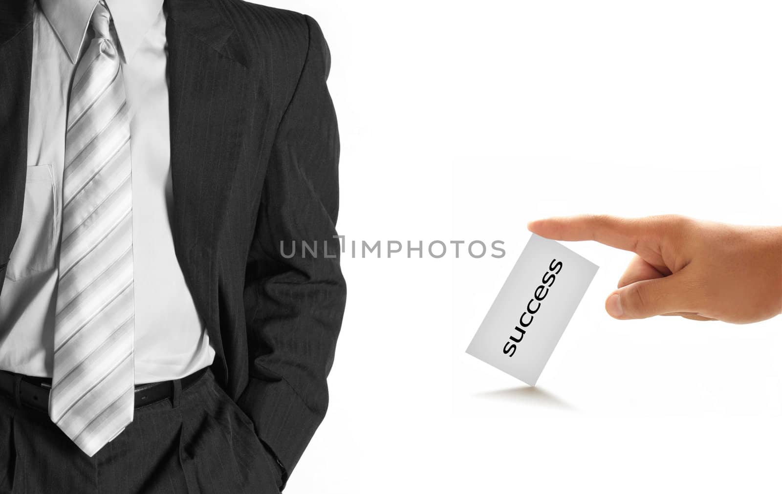 hand of businessman offering businesscard by ozaiachin